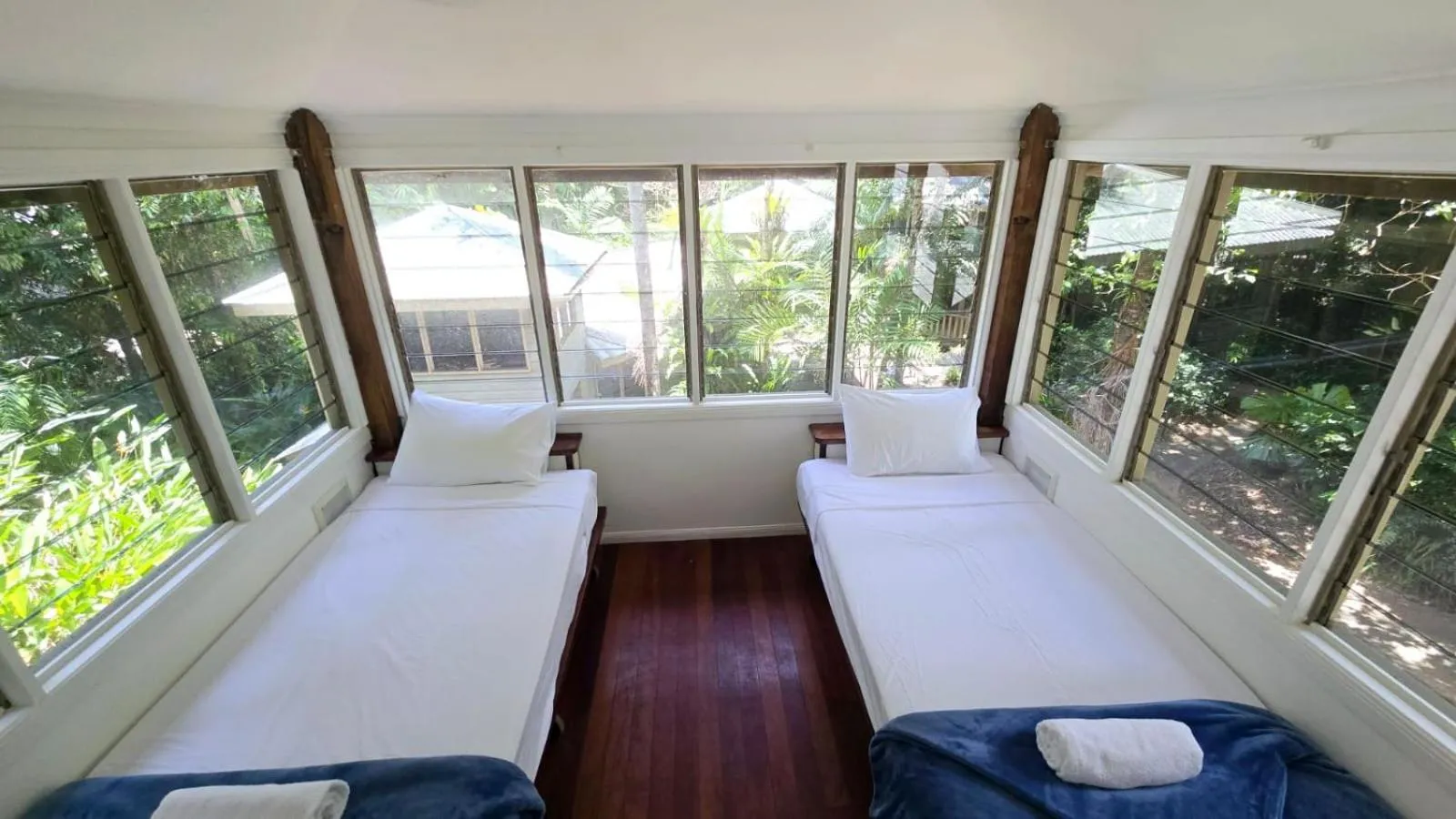Bed in Ferntree Rainforest Lodge