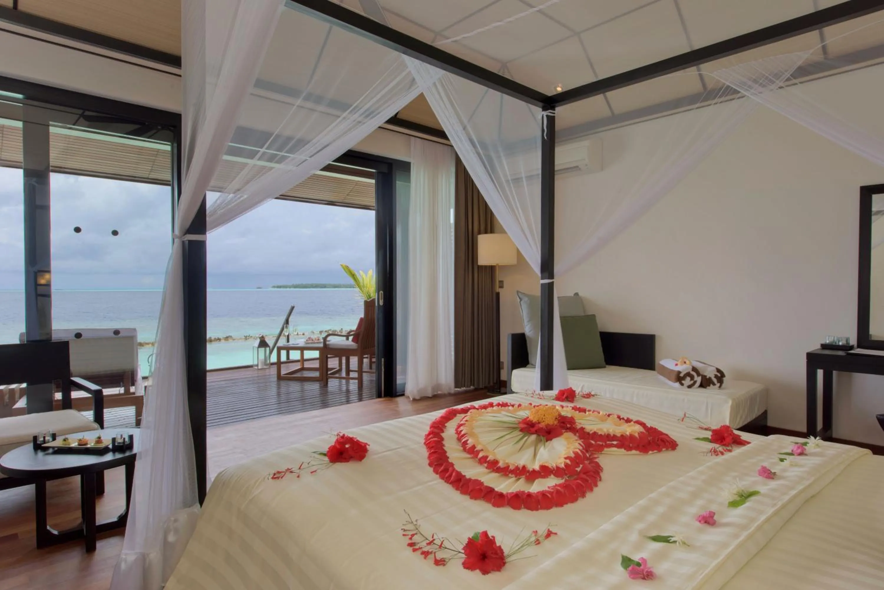 Bedroom, Bed in Lily Beach Resort and Spa - All Inclusive