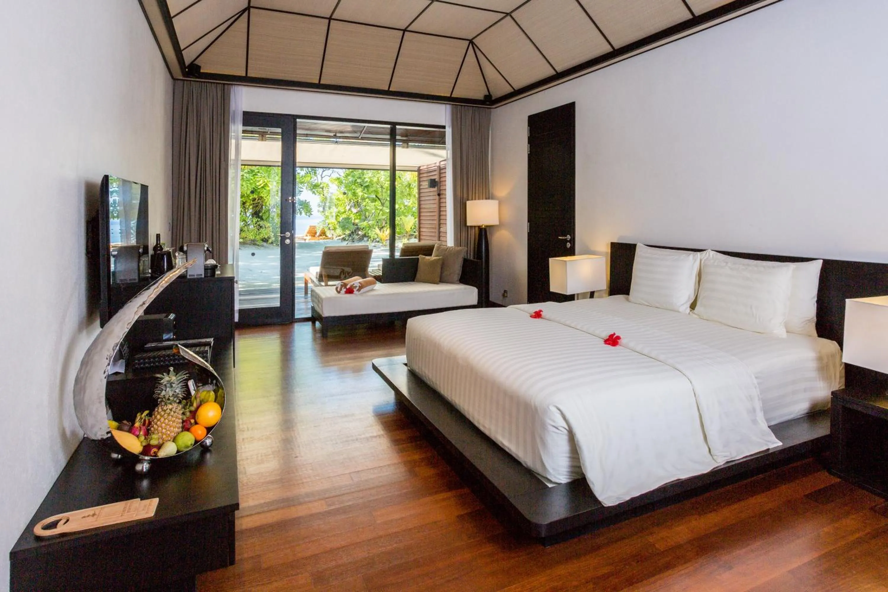 Bedroom, Bed in Lily Beach Resort and Spa - All Inclusive