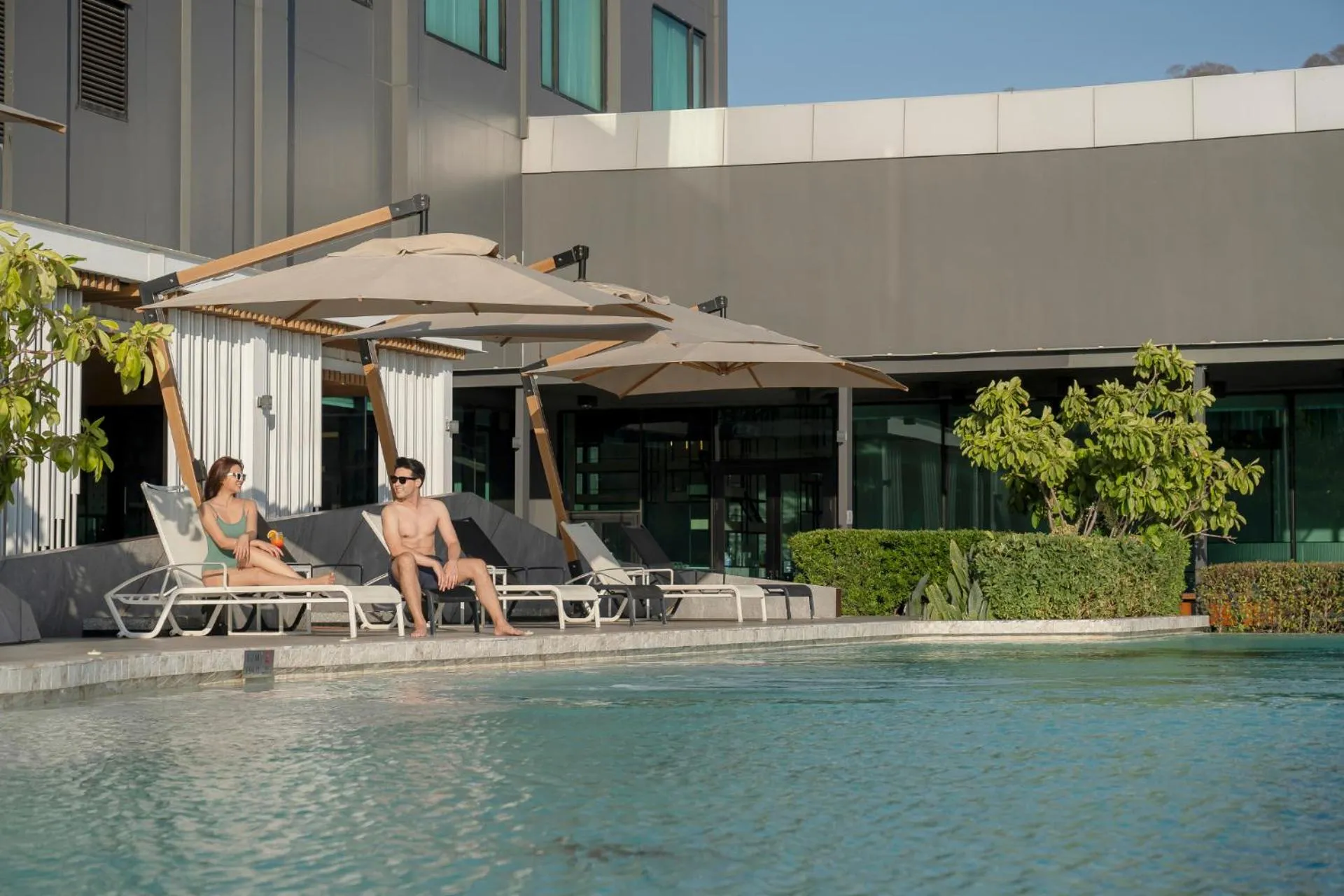 Swimming pool in Holiday Inn & Suites Siracha Laemchabang by IHG