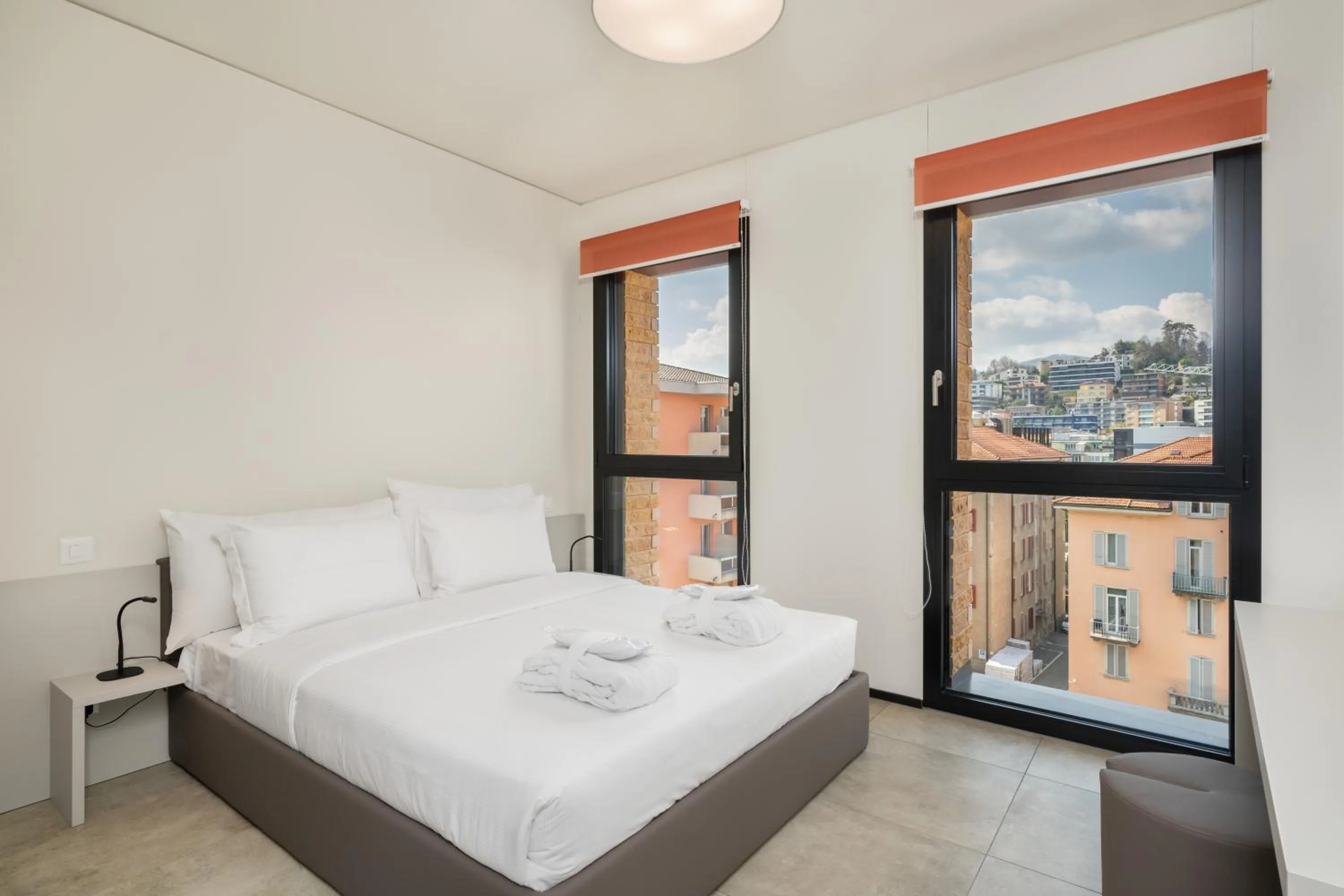 Bed in Swiss Hotel Apartments - Lugano