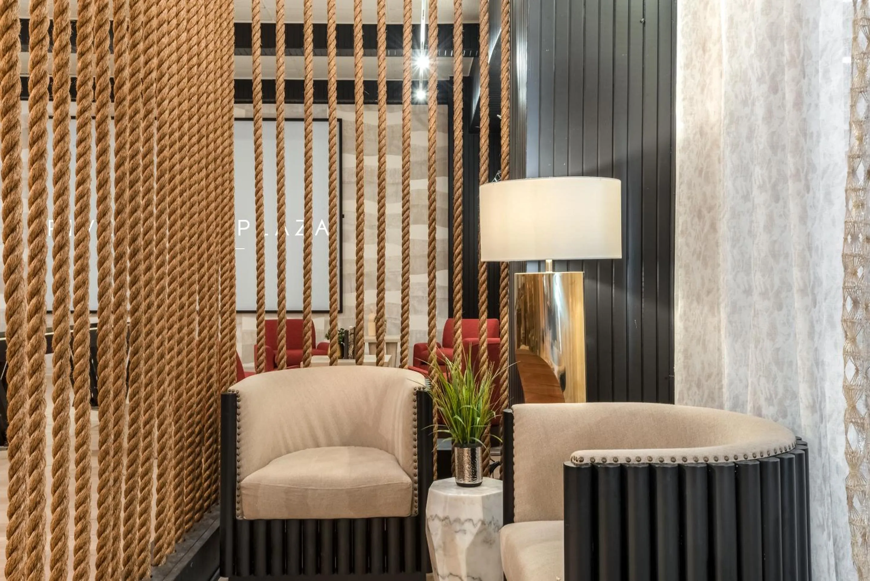 Communal lounge/ TV room in Riverwalk Plaza Hotel