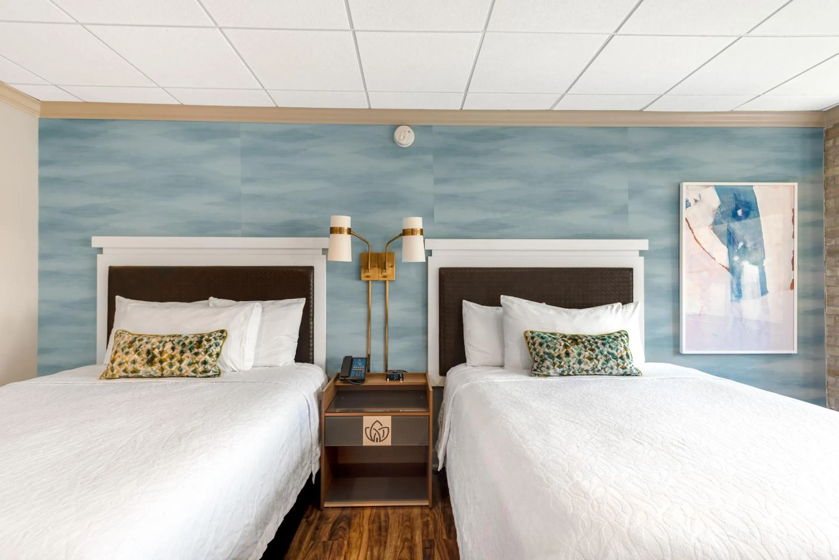 Bed in Riverwalk Plaza Hotel