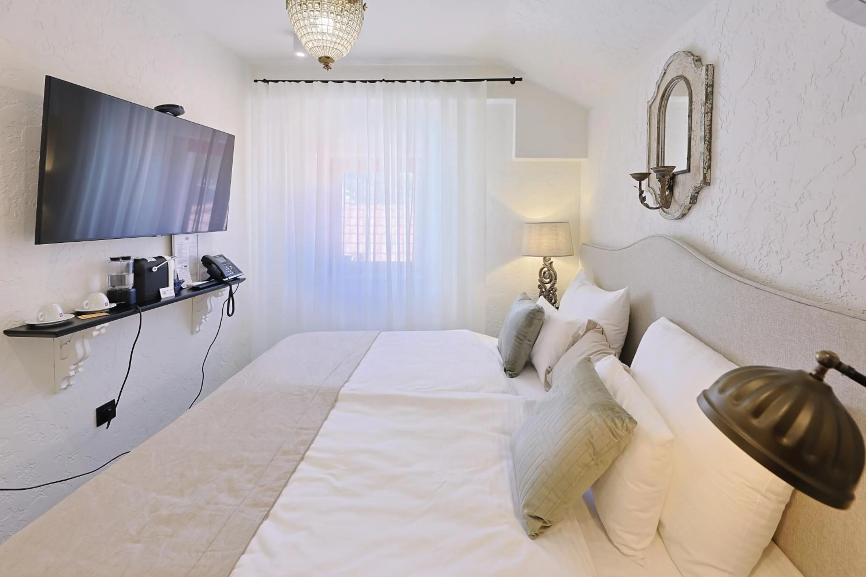 Bed in Integra Hotel