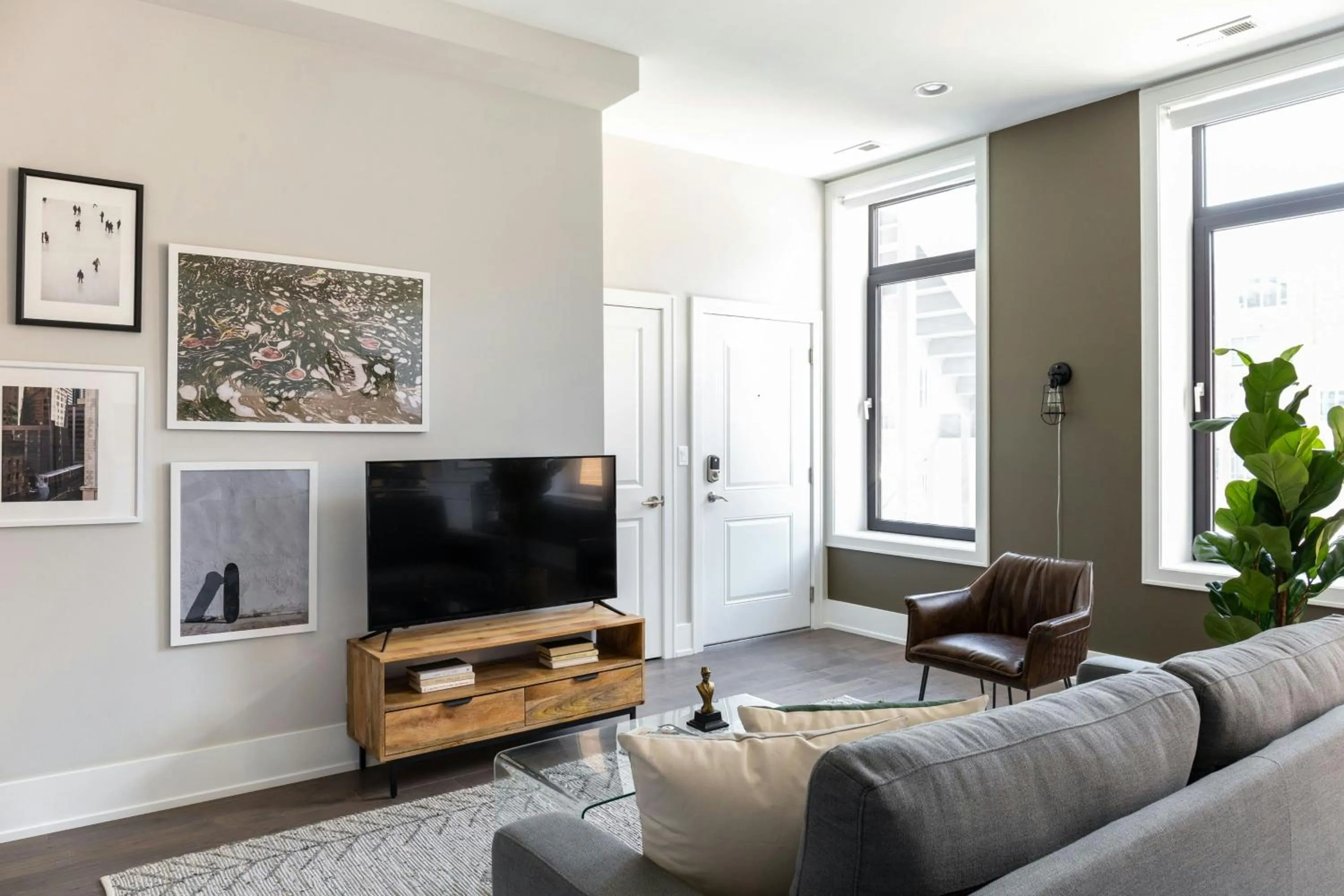 Living room in Sonder by Marriott Bonvoy Greektown Apartments