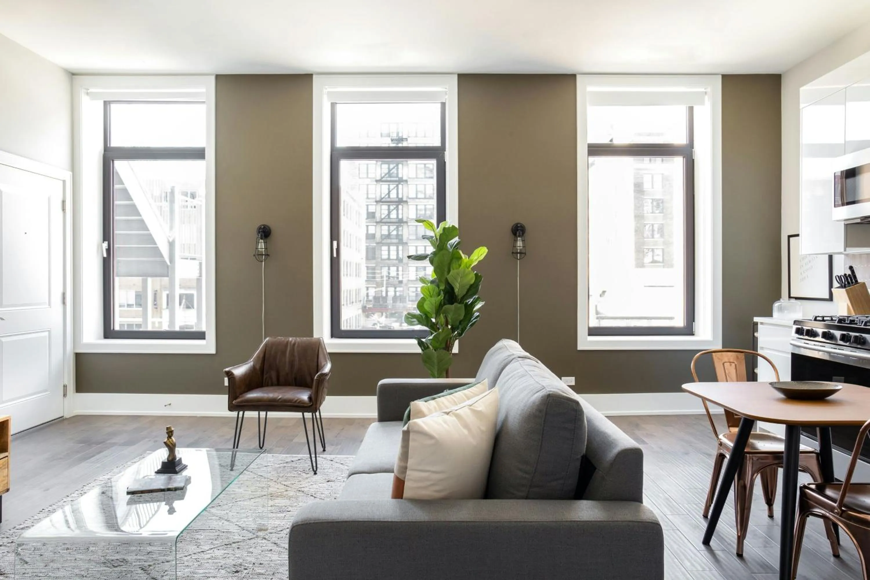 Living room in Sonder by Marriott Bonvoy Greektown Apartments