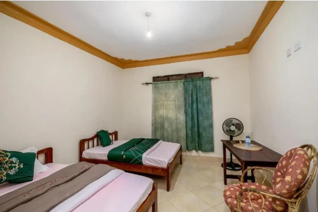 Standard Twin Room with Garden View in Airport Side Hotel Entebbe Standard Twin Room with Garden View in Airport Side Hotel Entebbe