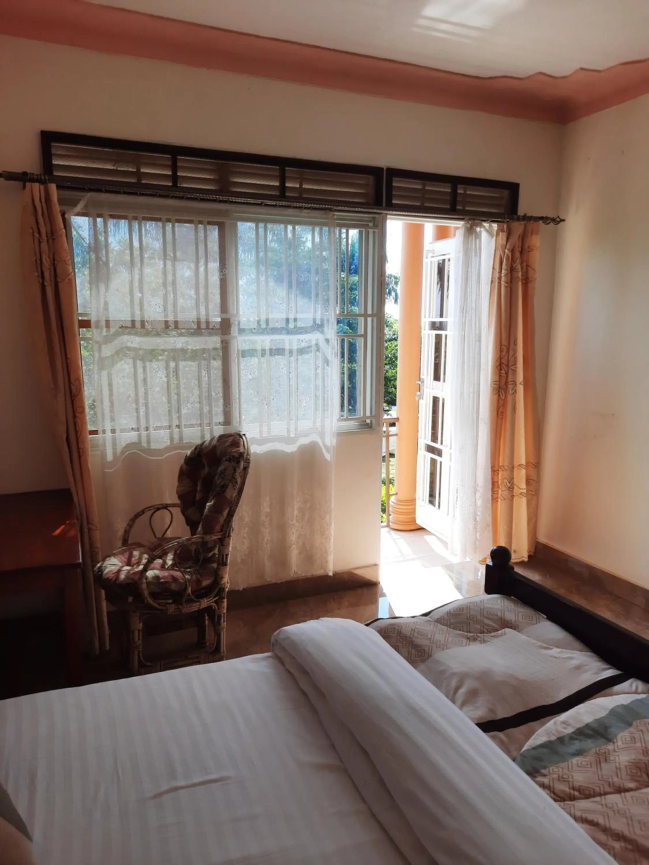 View (from property/room), Bed in Airport Side Hotel Entebbe