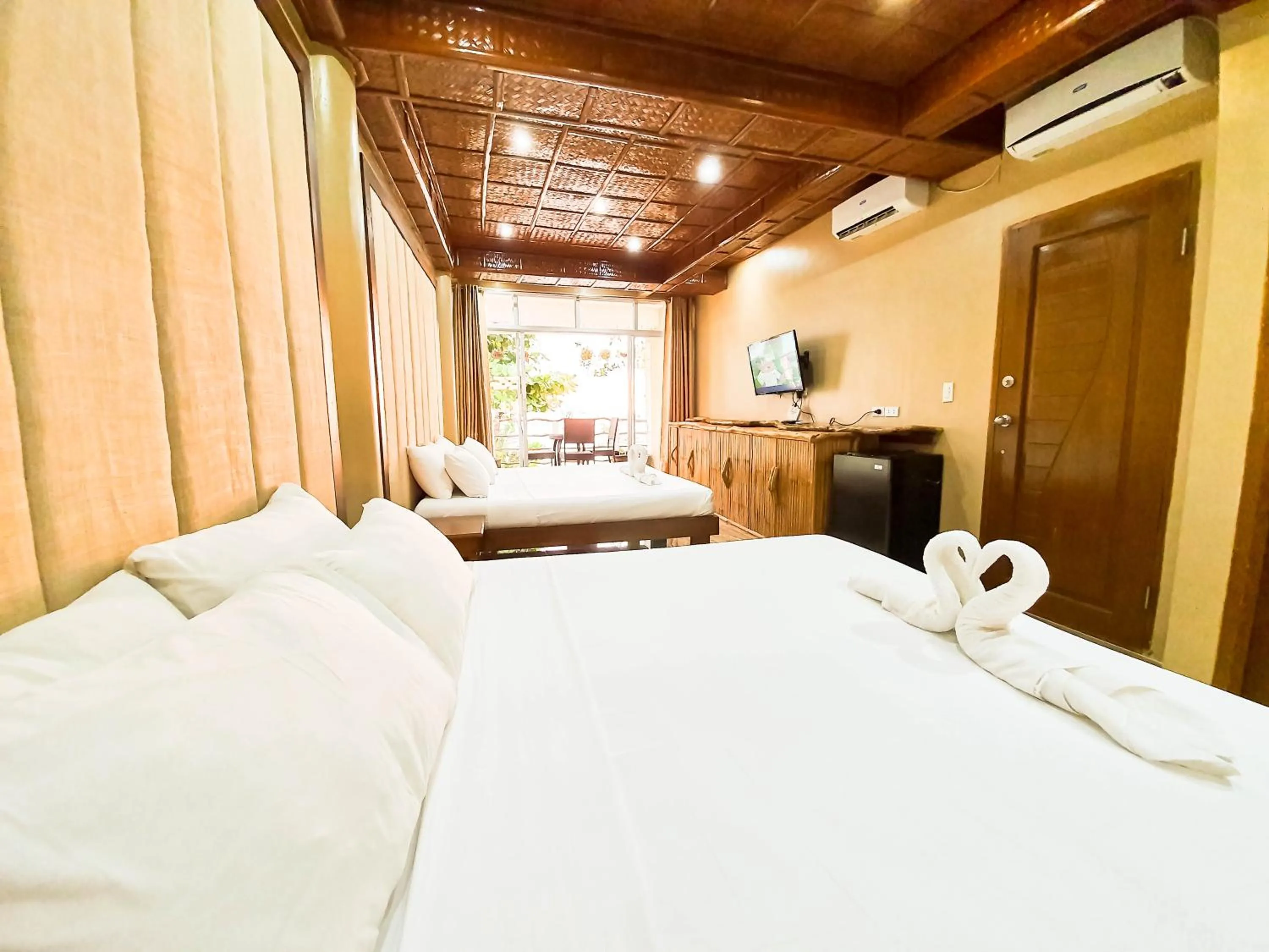 Bed in Kaiyana Boracay Beach Resort