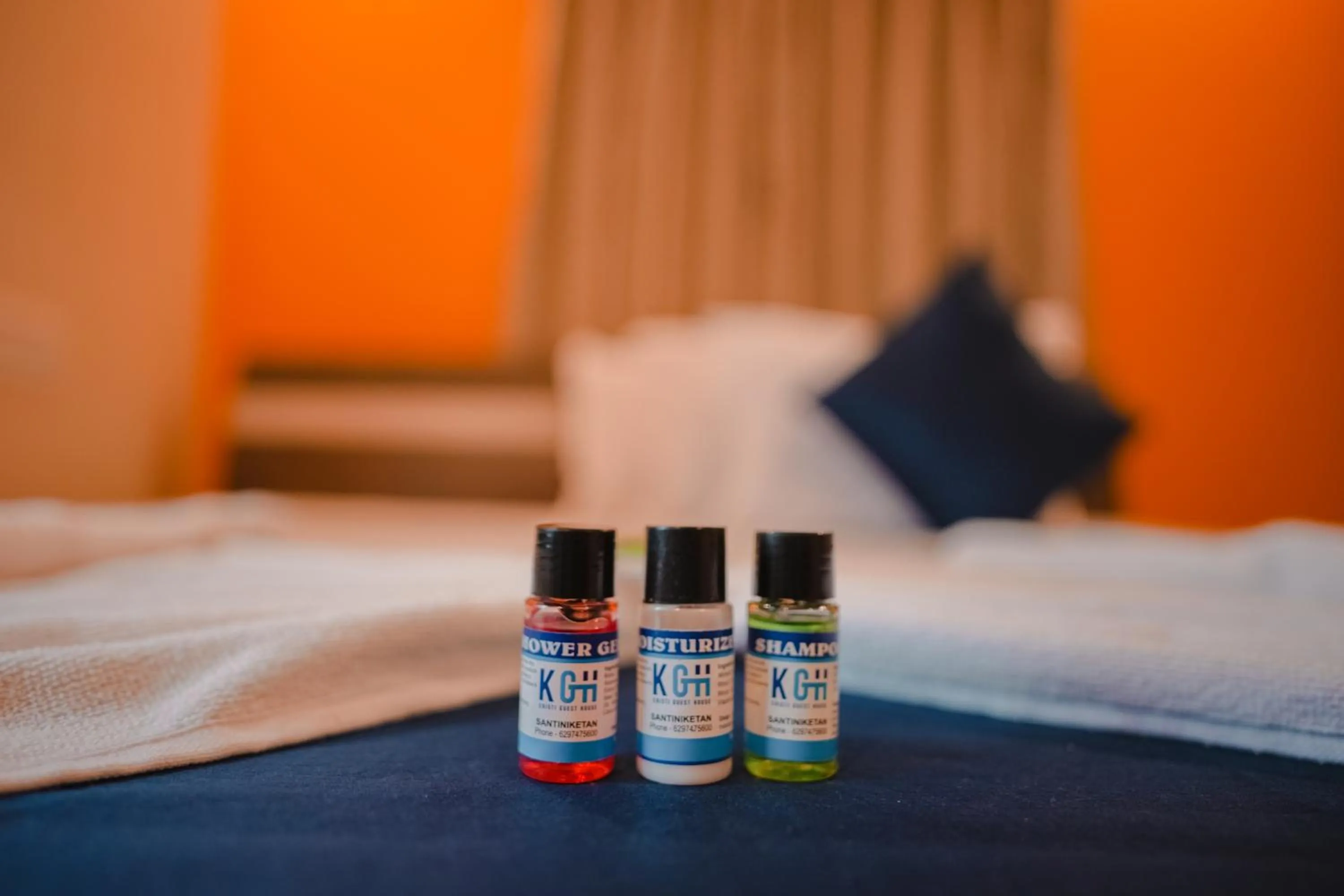towels, Bed in Kristi Guest House, Shantiniketan