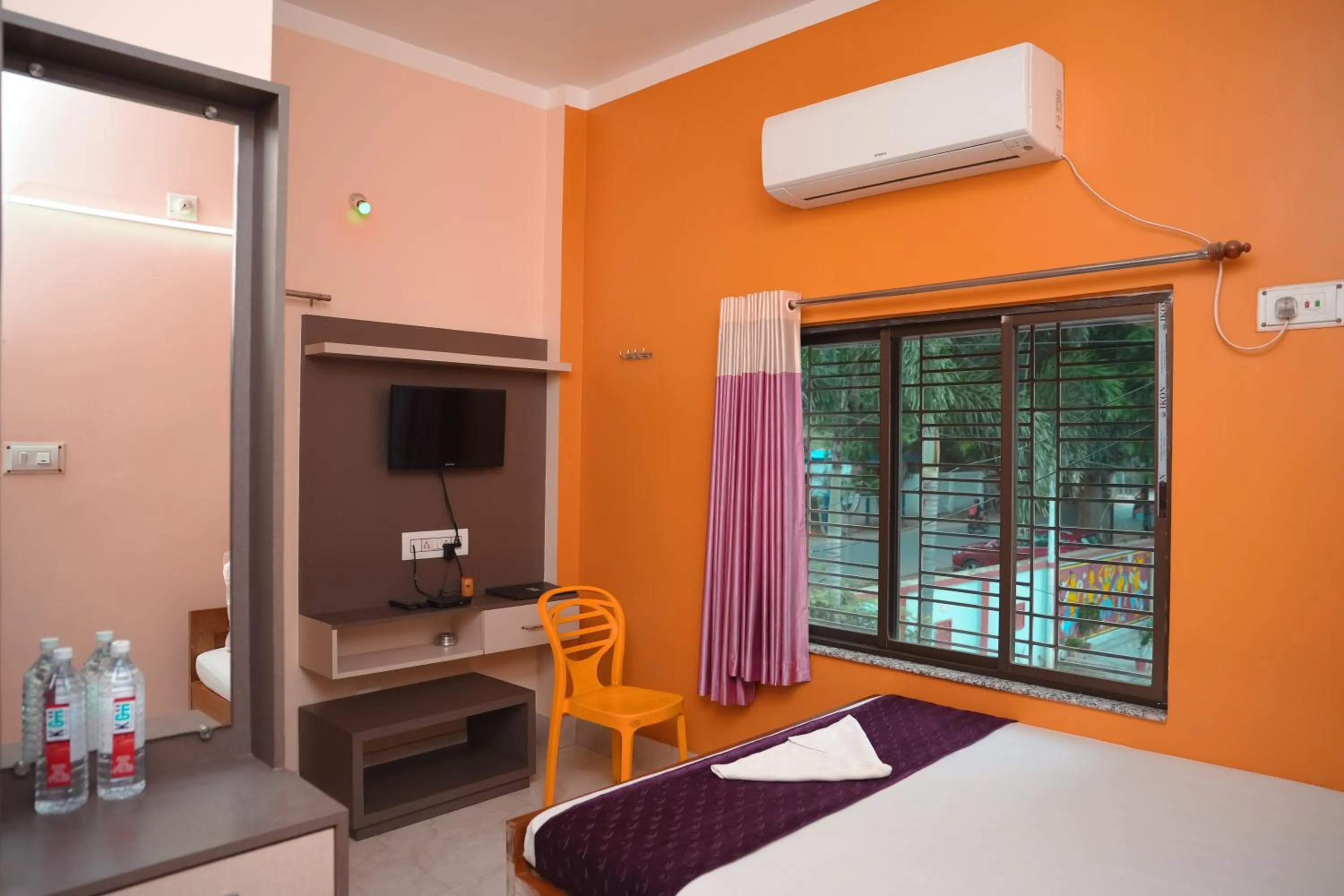 Photo of the whole room, Bed in Kristi Guest House, Shantiniketan