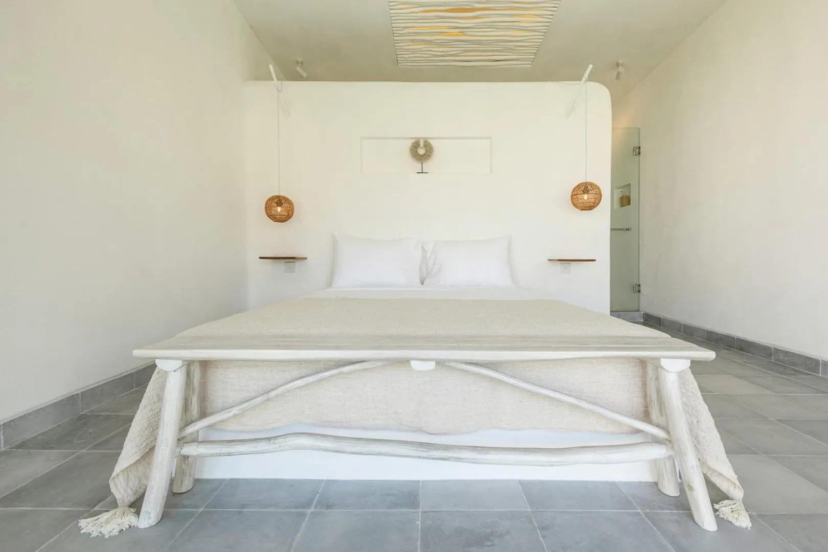 Bed in The Bingin Beach Villas' Bungalow Resort