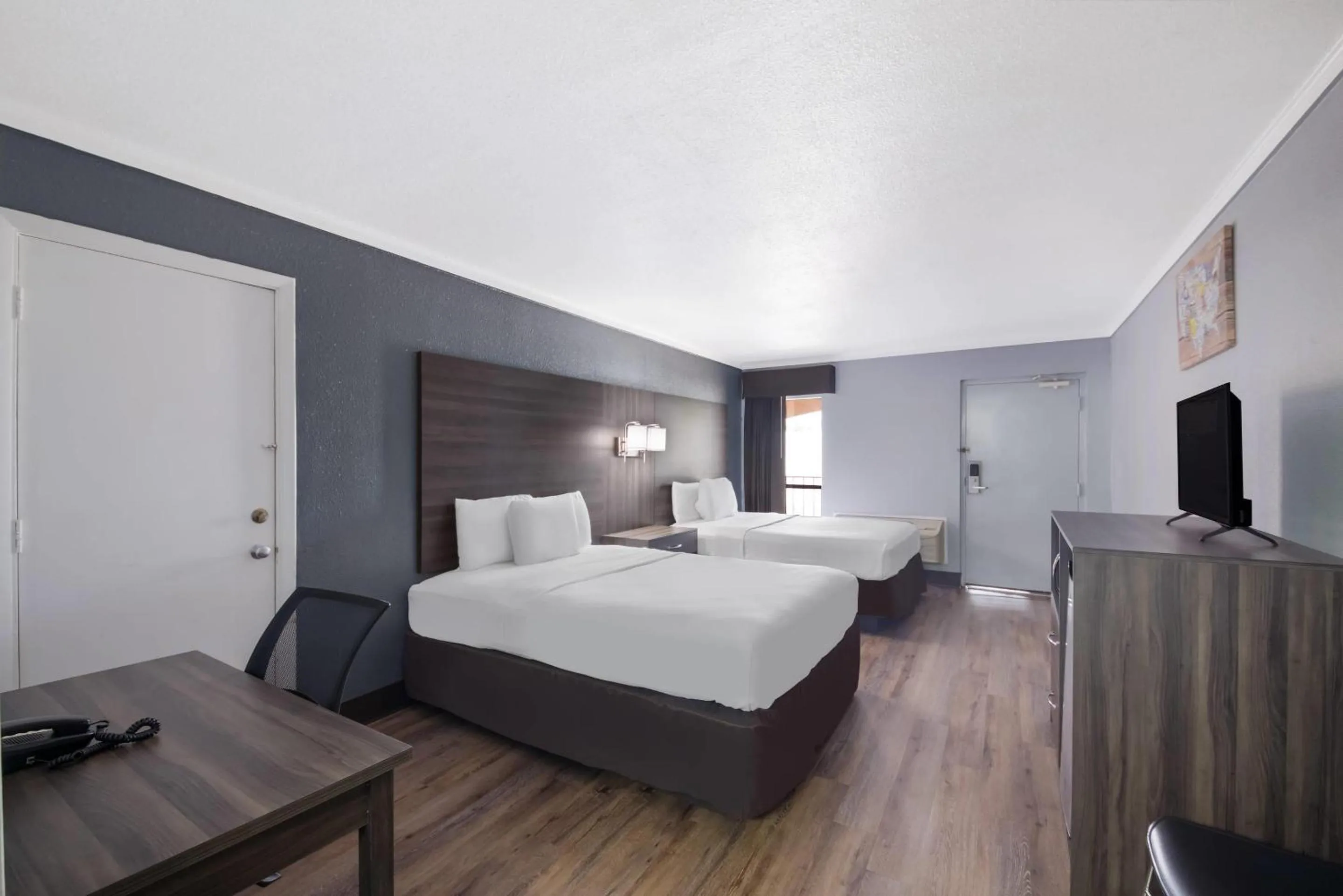 Bedroom, Bed in Econo Lodge Austin North near The Domain