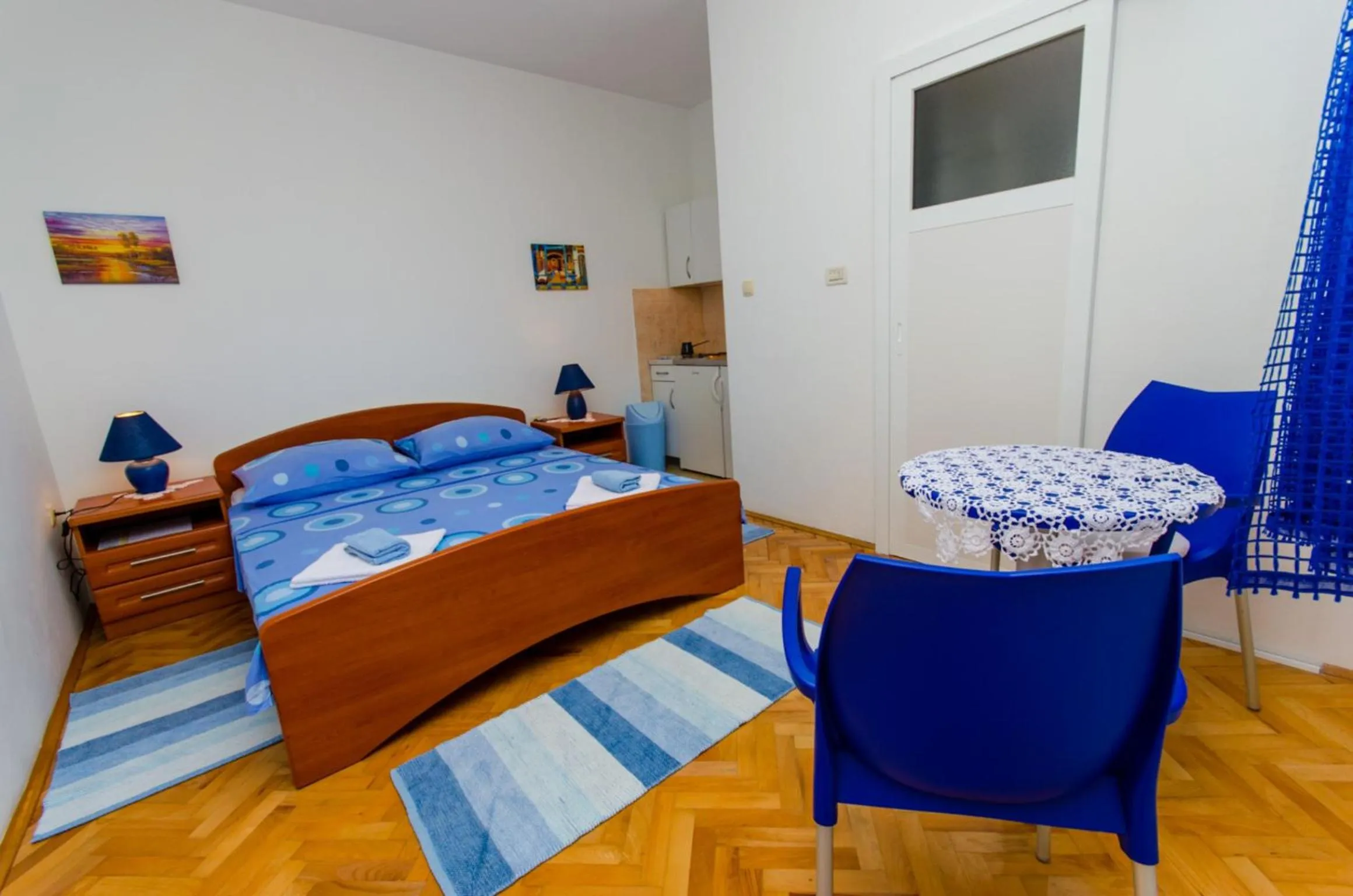 Kitchen or kitchenette, Bed in Apartments Ivana