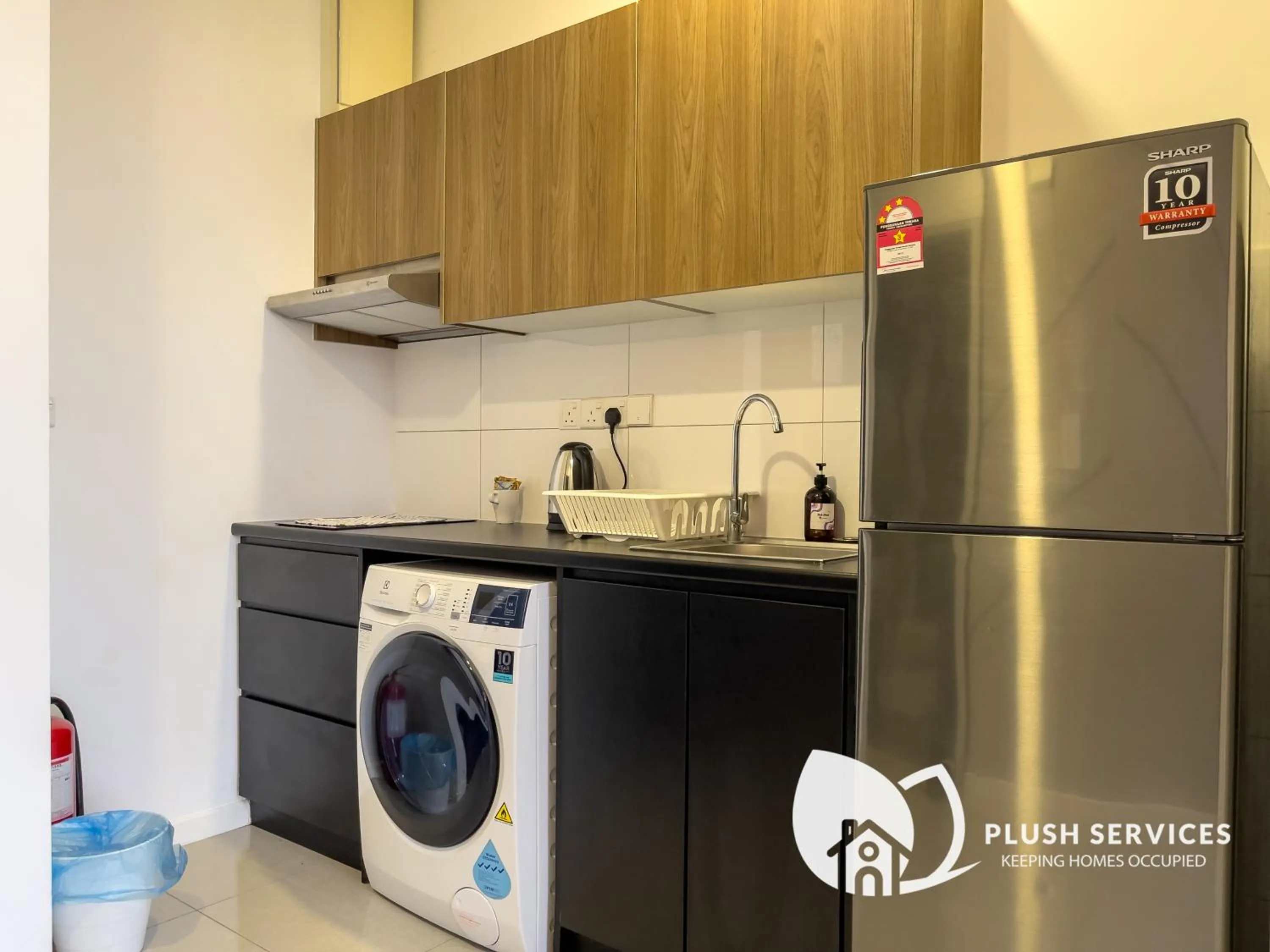 washing machine in HighPark Suites in Petaling Jaya, Kelana Jaya by Plush