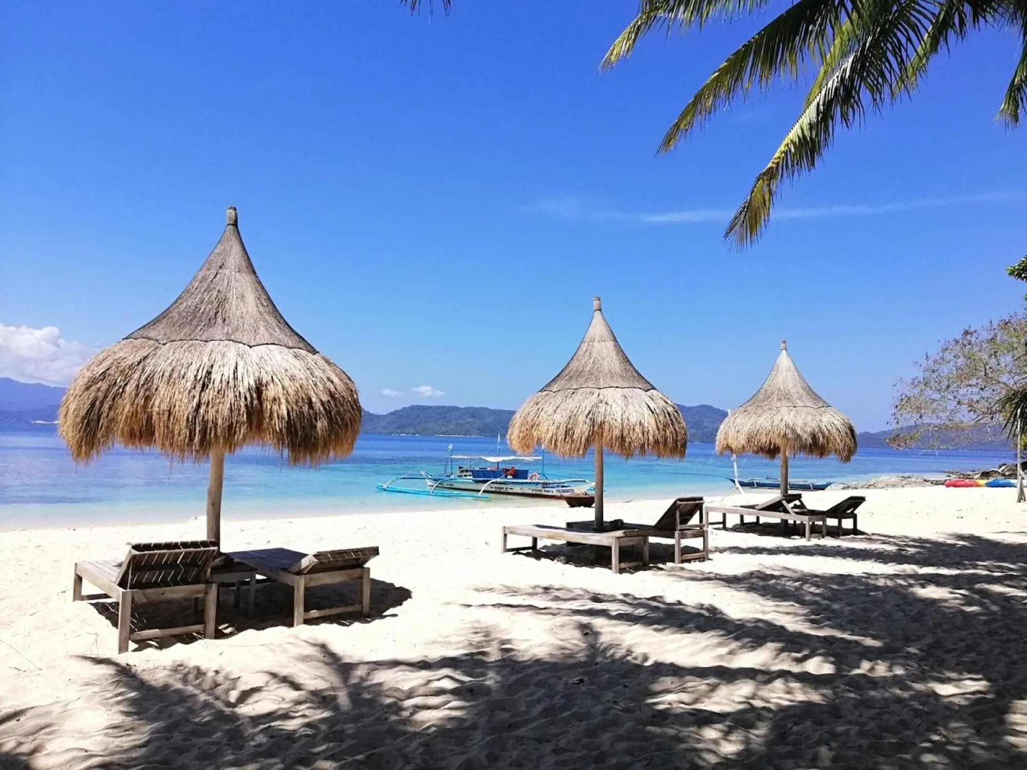 Beach in Basio's Place Tourist Inn by RedDoorz