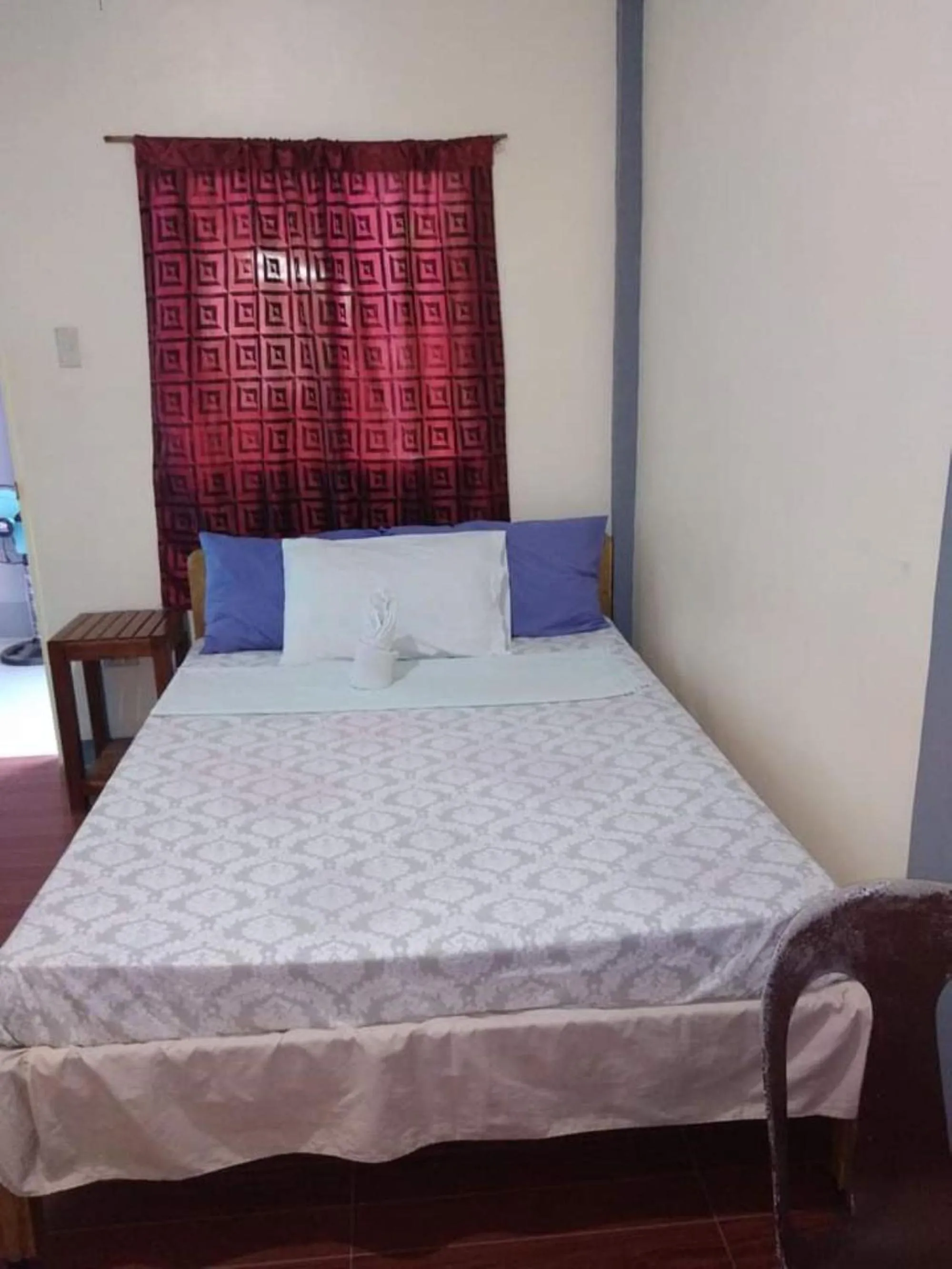 Bed in Basio's Place Tourist Inn by RedDoorz