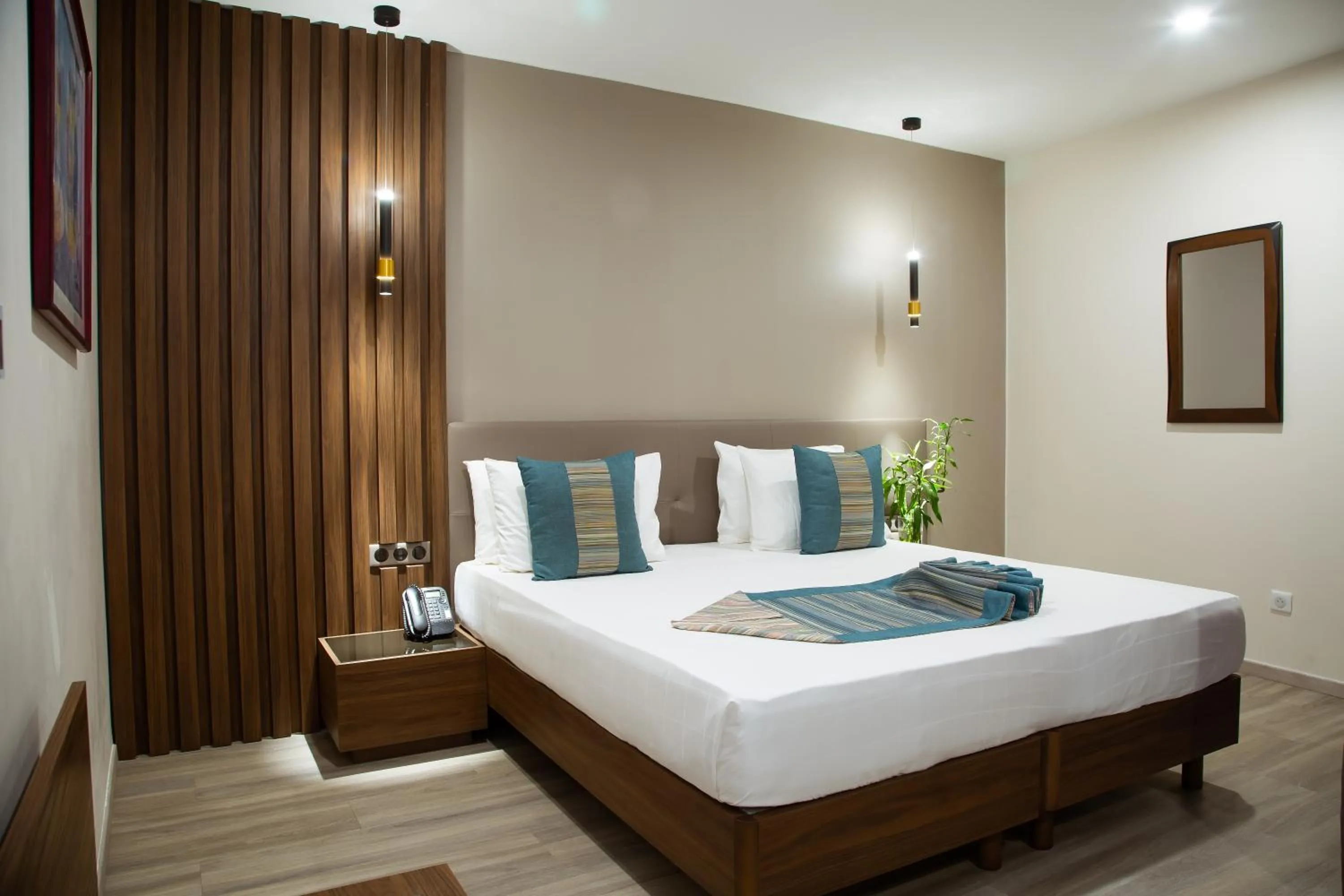 Bed in Le Ndiambour Hôtel et Résidence