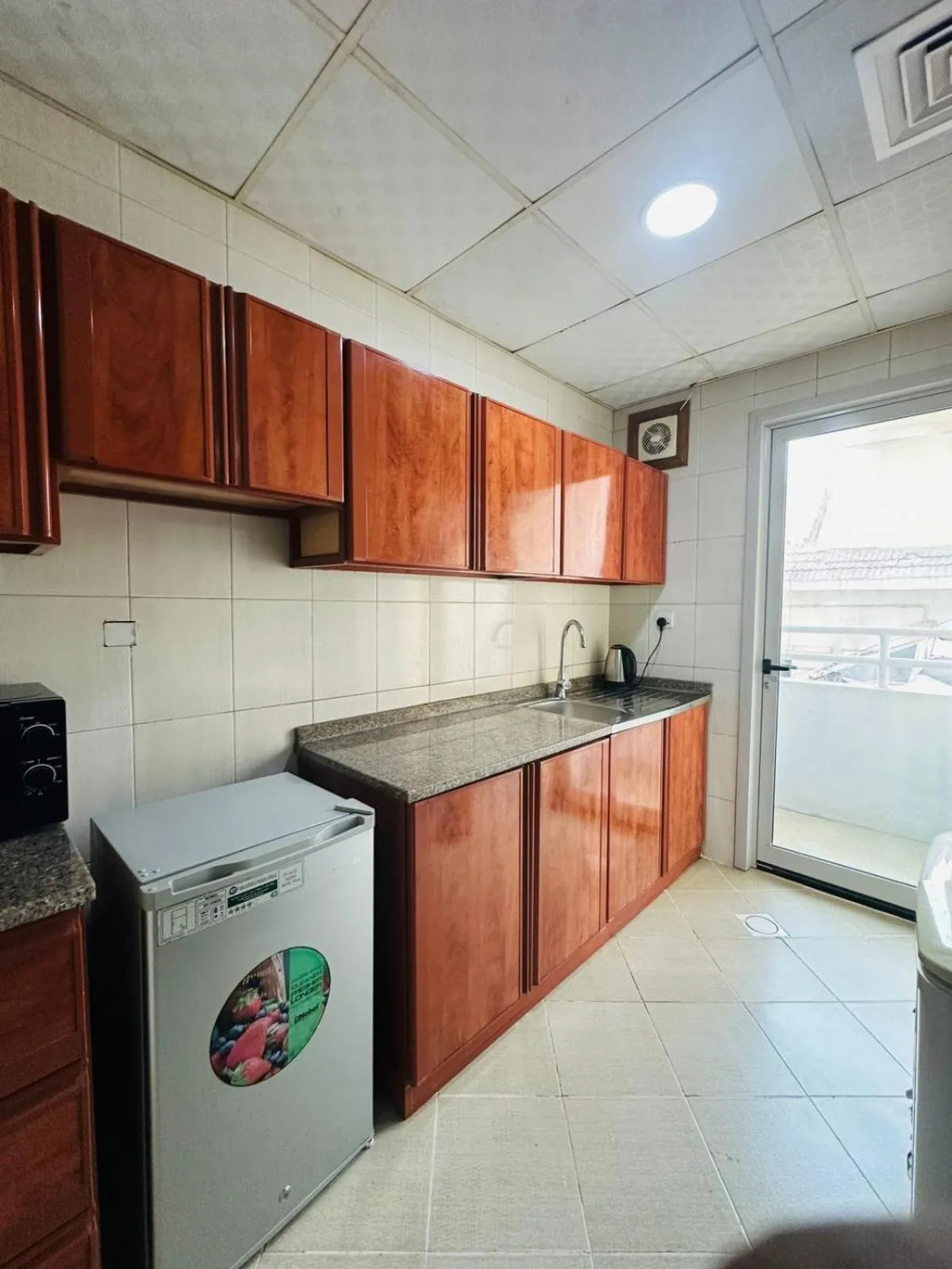 Kitchen or kitchenette in Al Khaleej Plaza Furnished Hotel Apartments