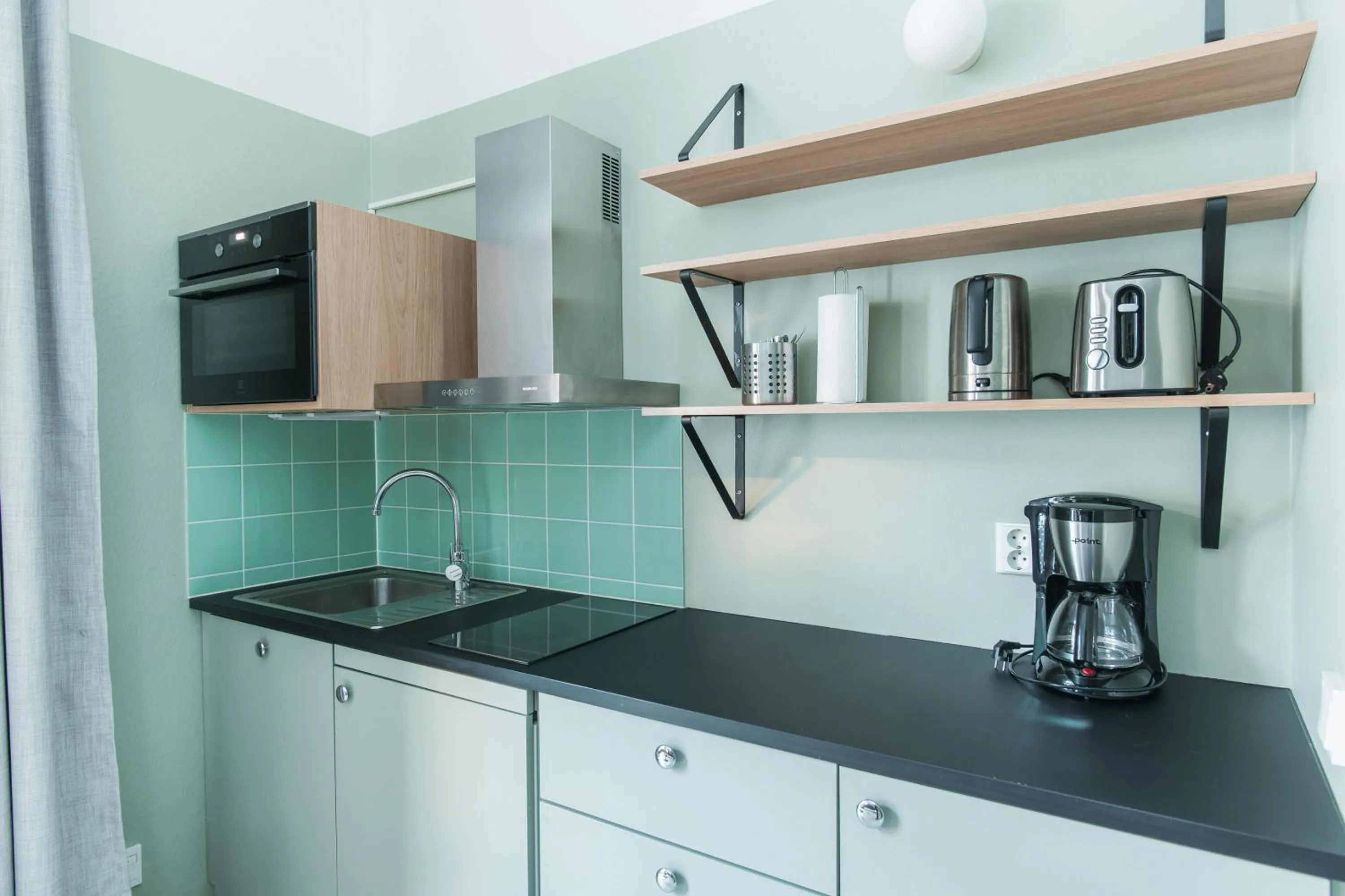 Kitchen or kitchenette in Forenom Aparthotel Jyväskylä