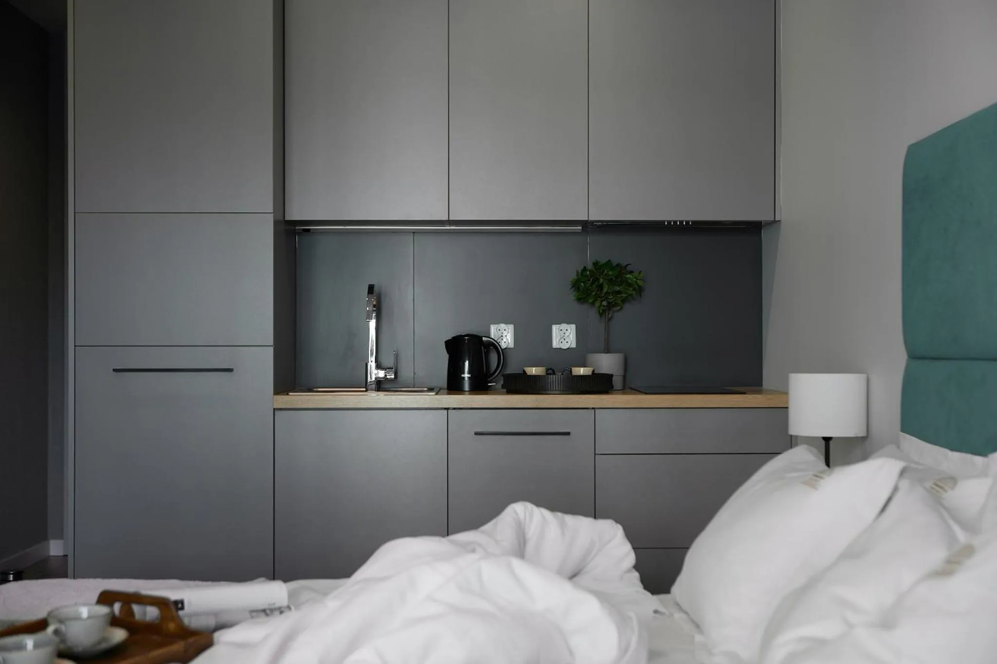 Kitchen or kitchenette, Bed in Fragola Apartments Rajska 3 - modern studios, park