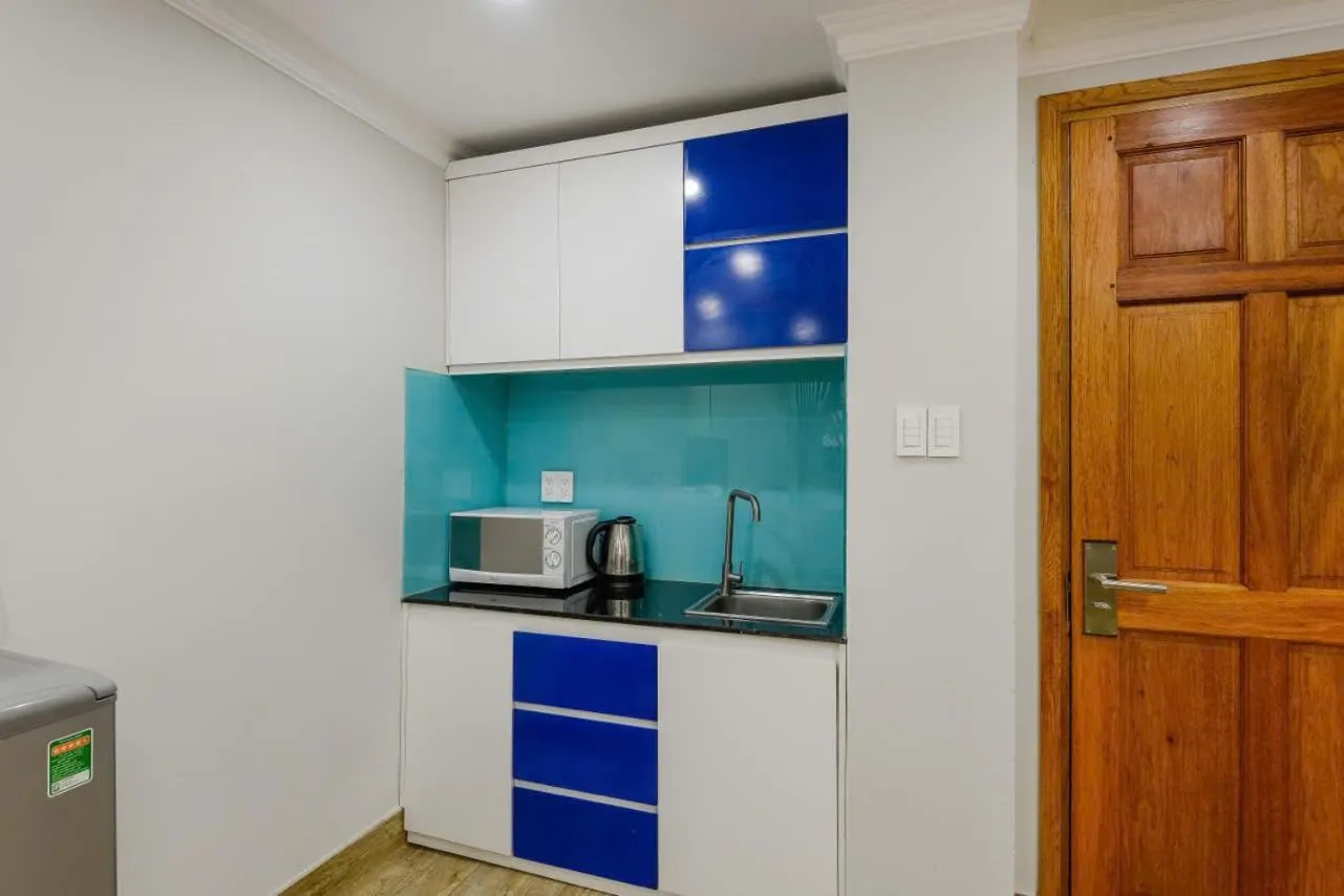 stove in Warm Ways 3 Hotel & Serviced Apartments