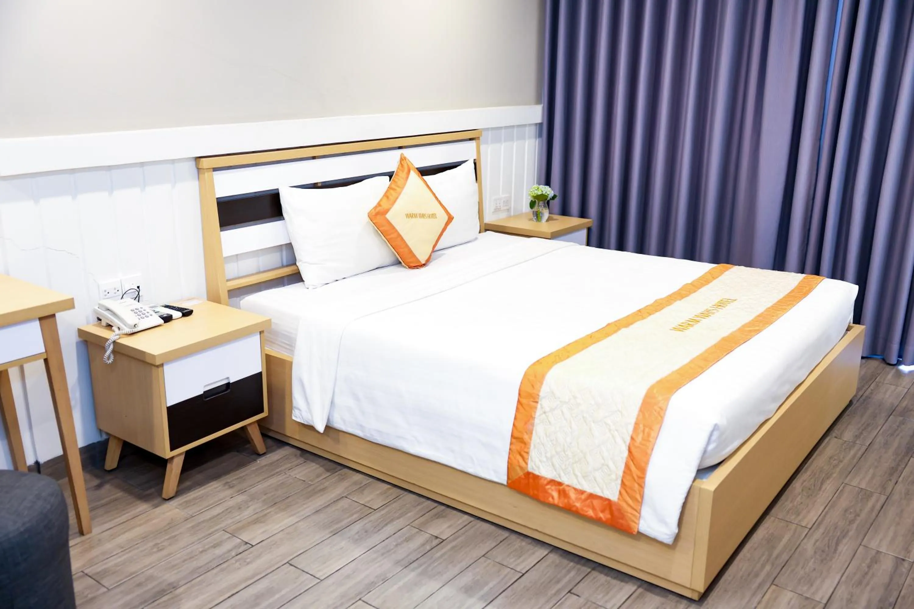 Bed in Warm Ways Hotel & Serviced Apartments