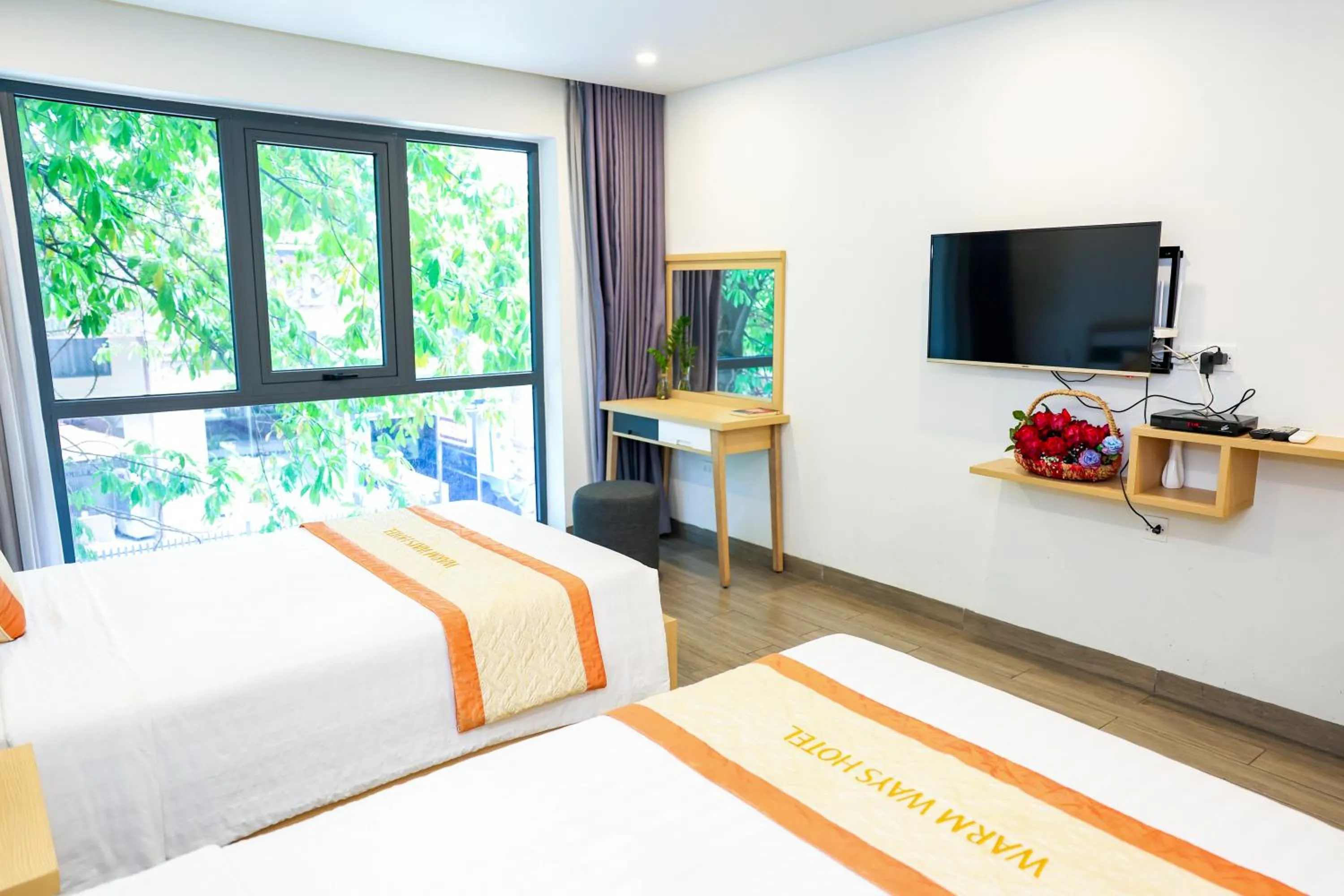 Bed in Warm Ways Hotel & Serviced Apartments