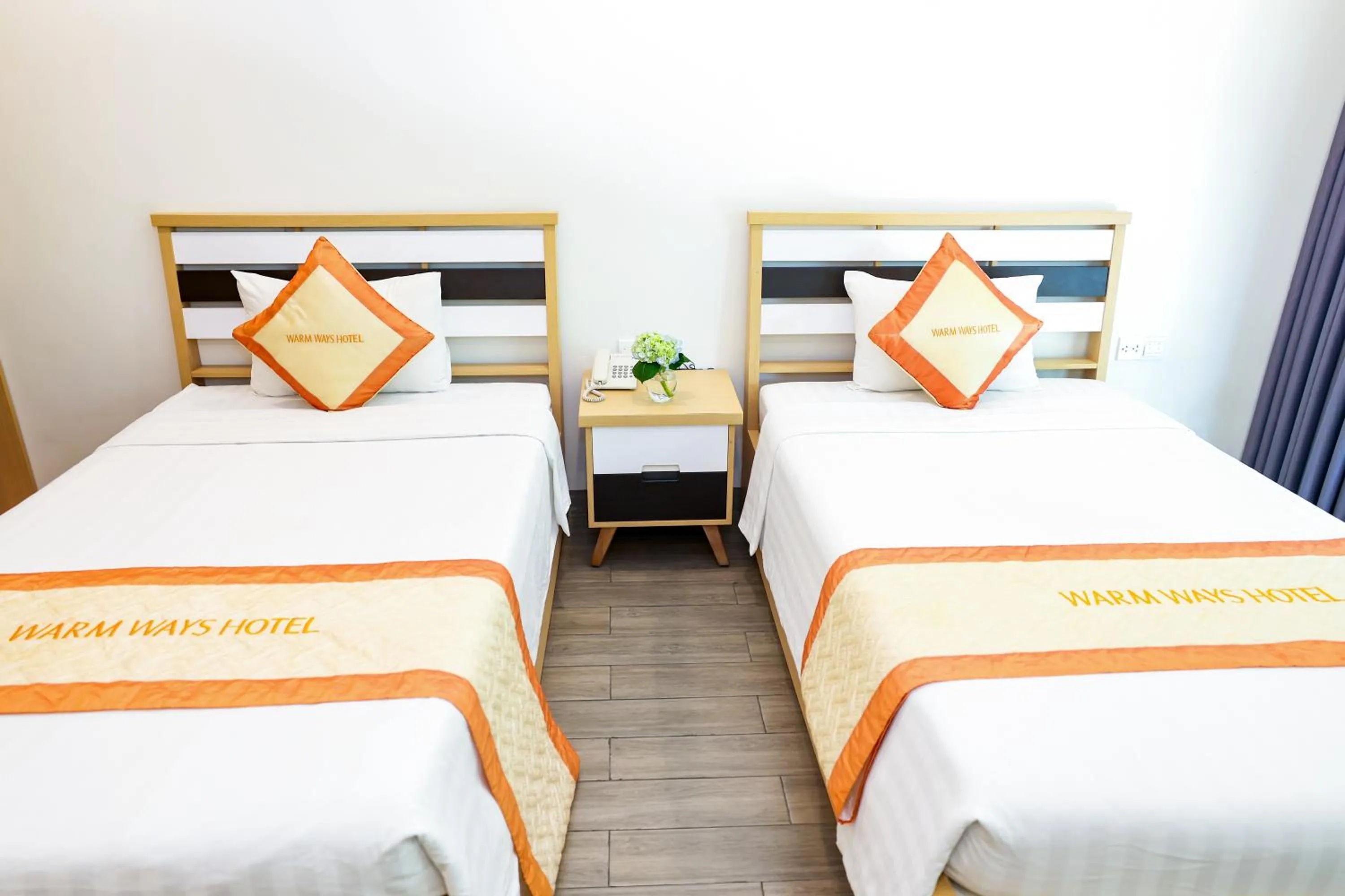 Bed in Warm Ways Hotel & Serviced Apartments