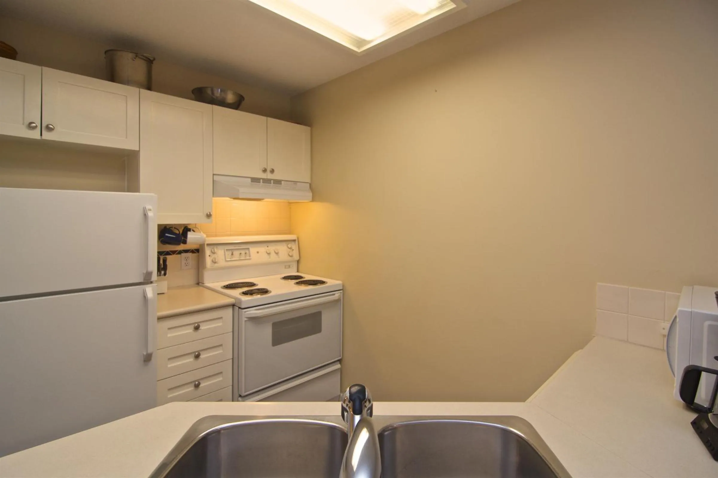 Kitchen or kitchenette in Whistler Blackcomb Vacation Rentals - Village North