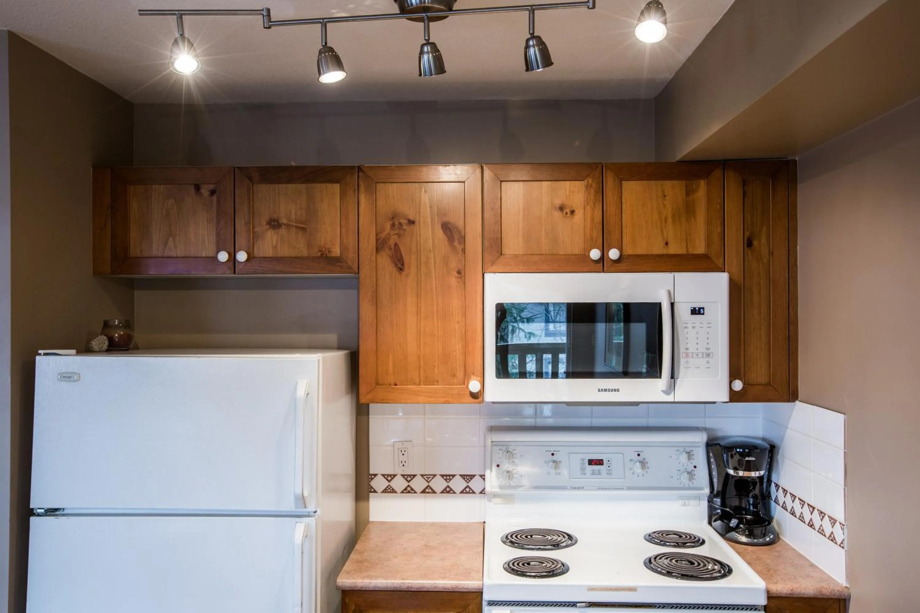 Kitchen or kitchenette in Whistler Blackcomb Vacation Rentals - Village North