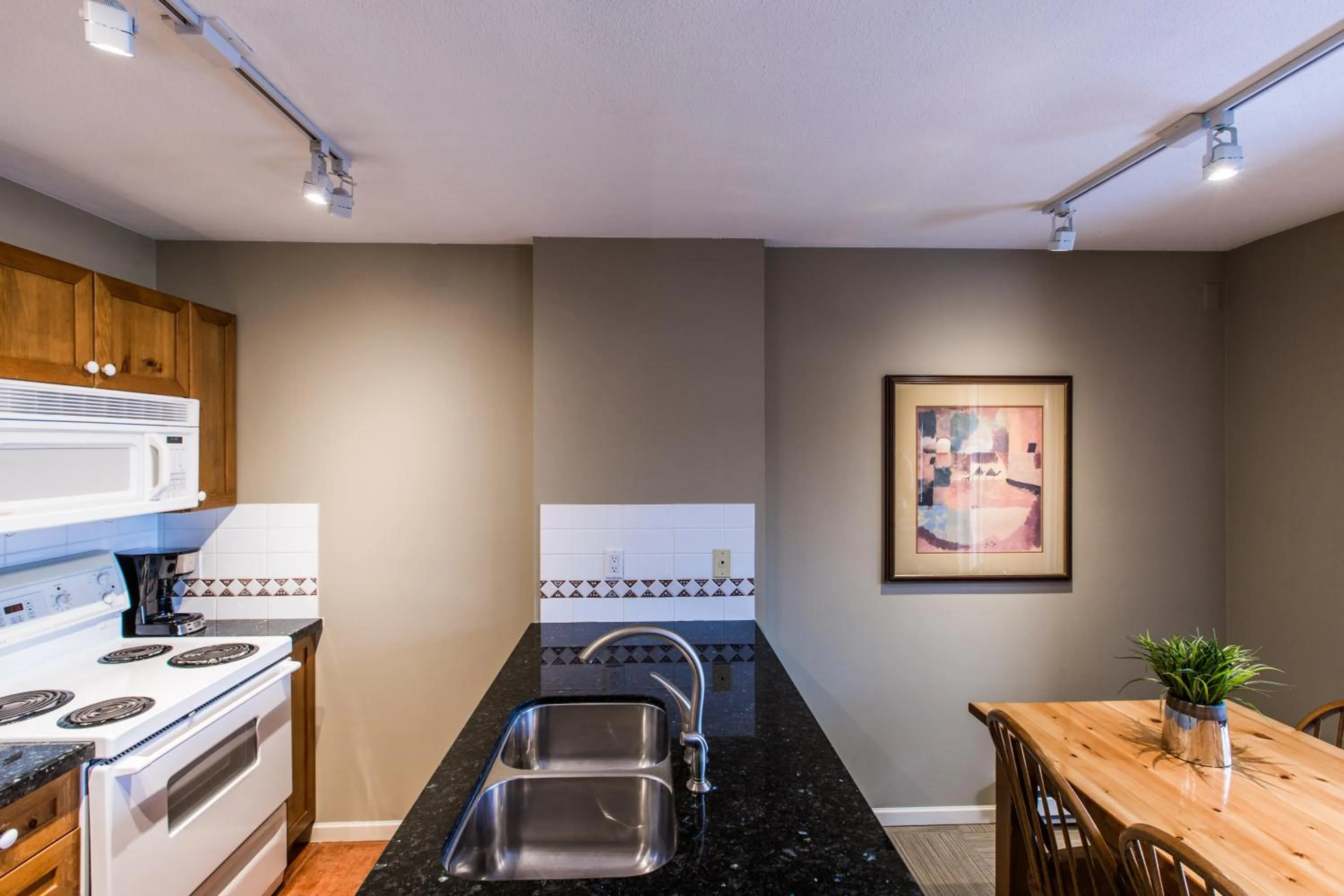 Kitchen or kitchenette in Whistler Blackcomb Vacation Rentals - Village North