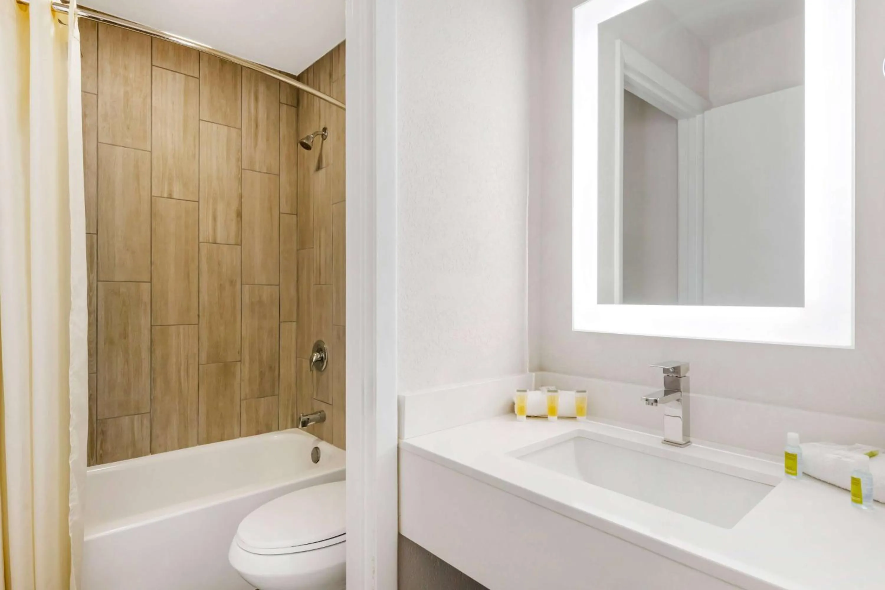 Photo of the whole room in Super 8 by Wyndham Orlando Near Florida Mall