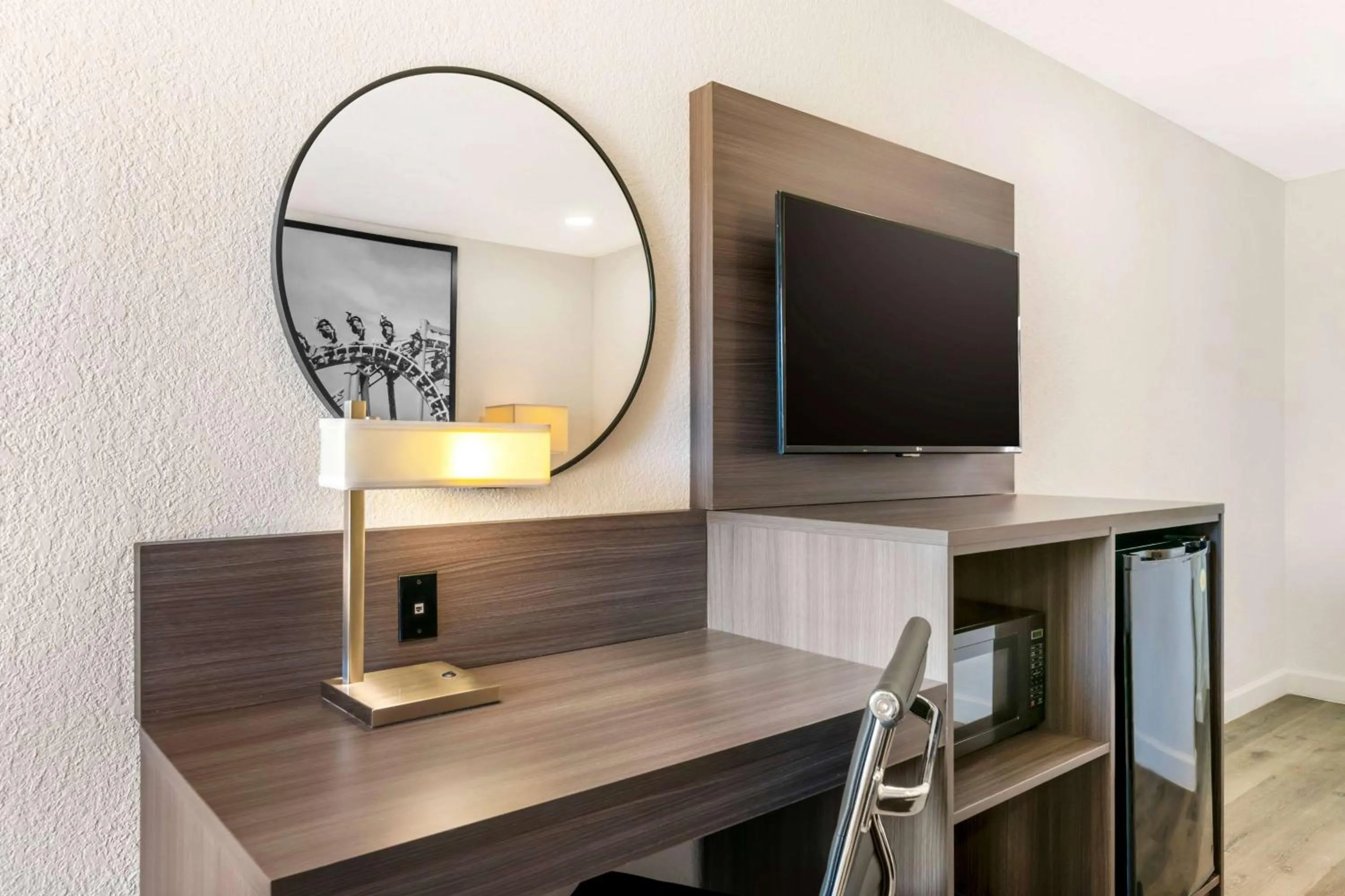 Photo of the whole room in Super 8 by Wyndham Orlando Near Florida Mall