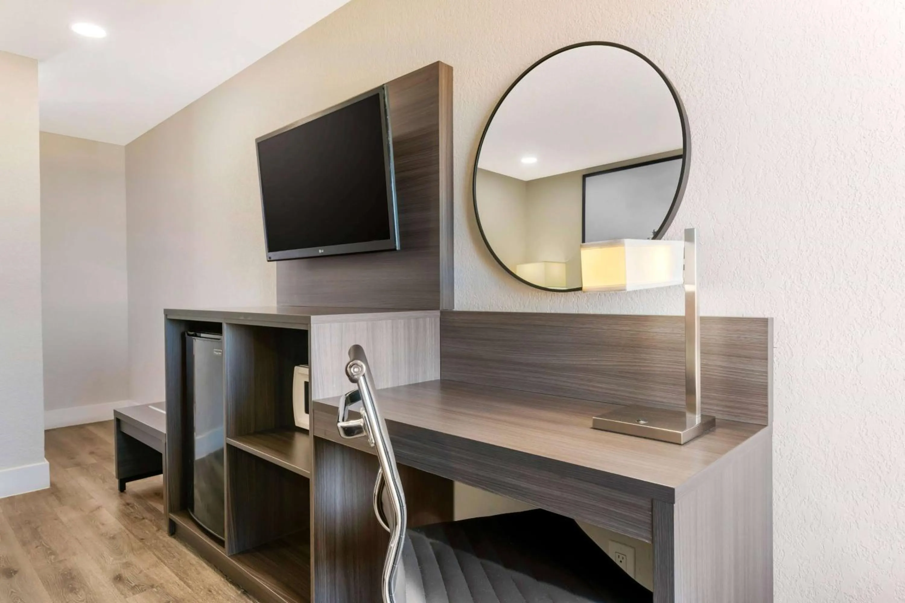 Photo of the whole room in Super 8 by Wyndham Orlando Near Florida Mall