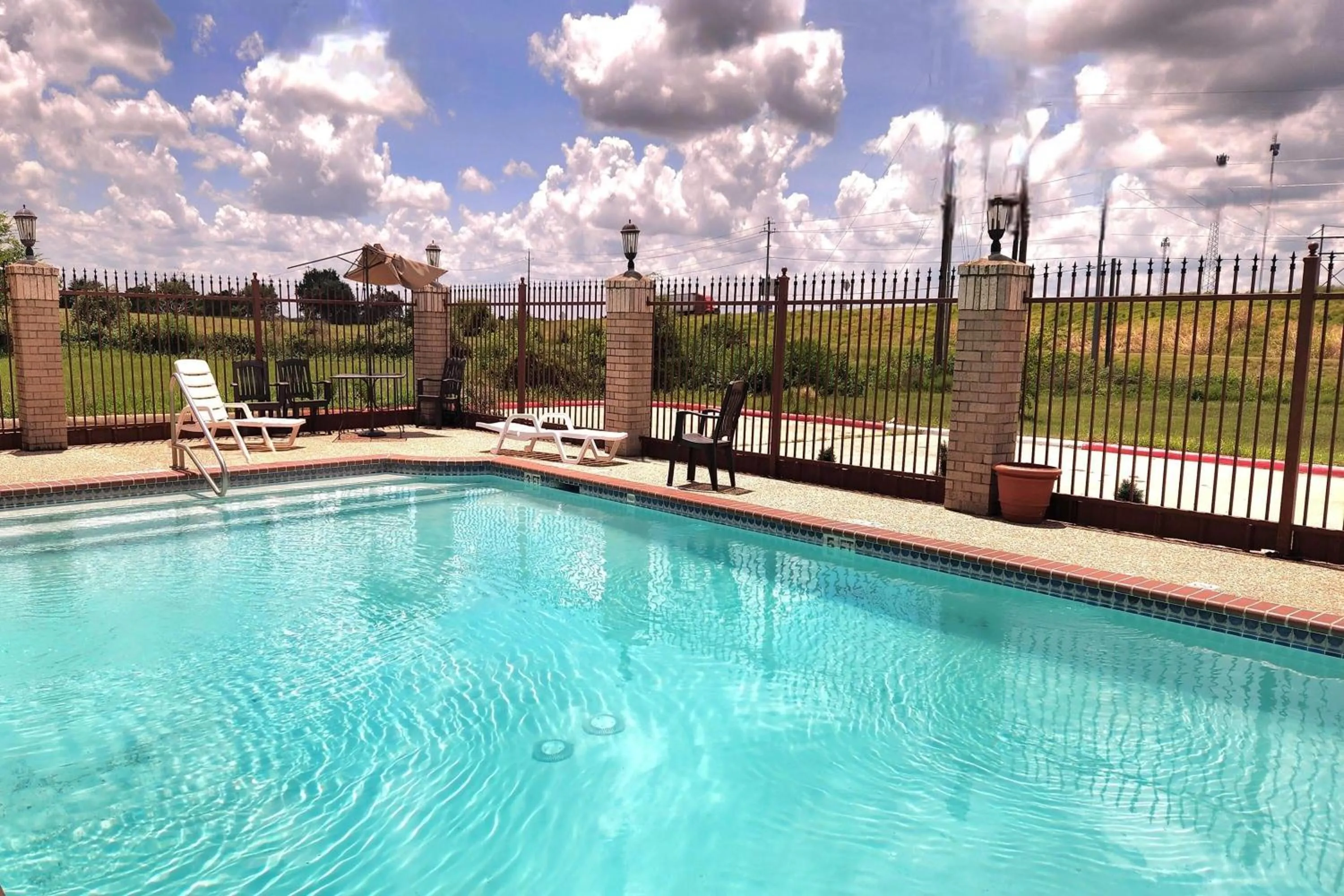Pool view in Days Inn by Wyndham Navasota