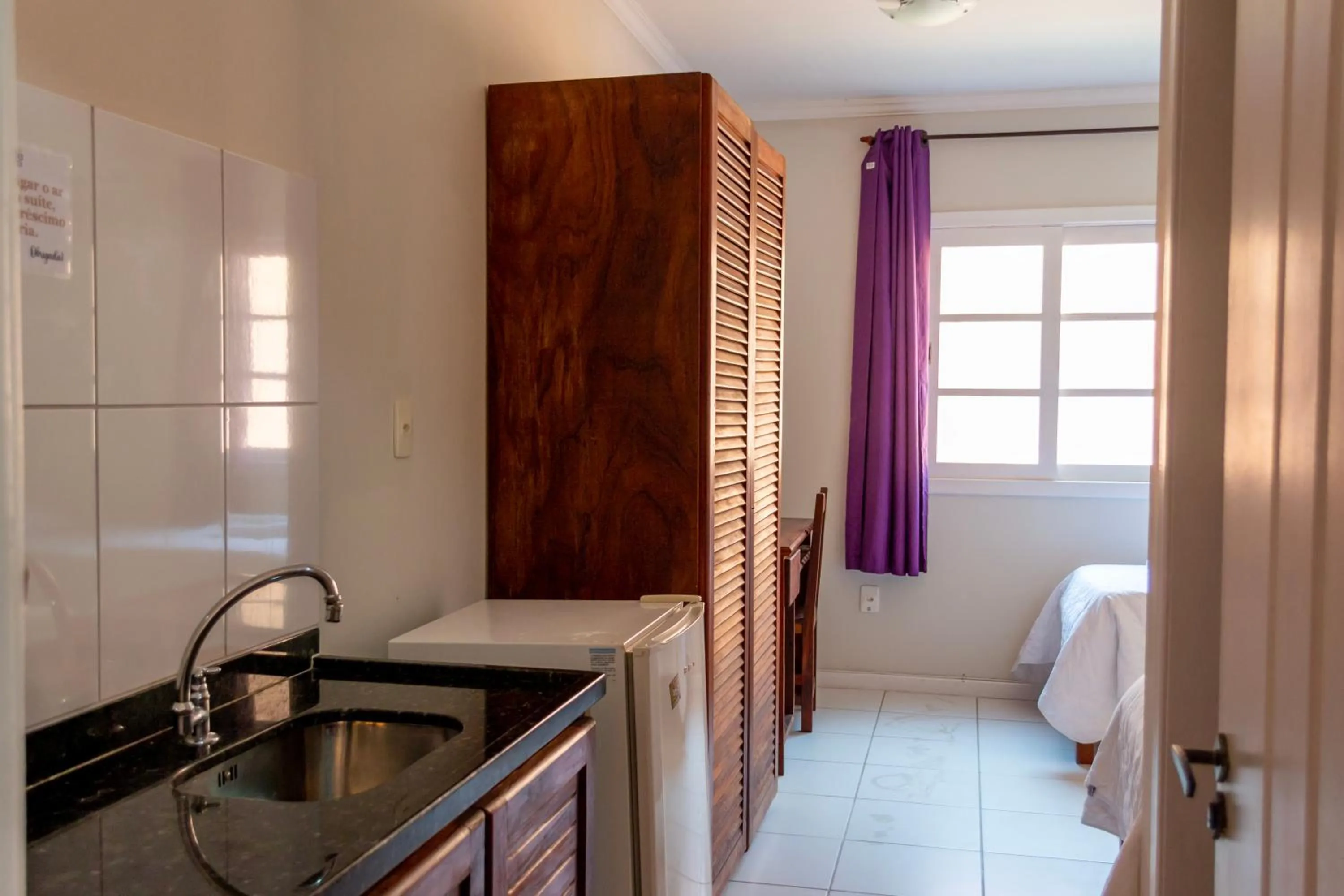 Bed in Pousada Estrada do Ouro