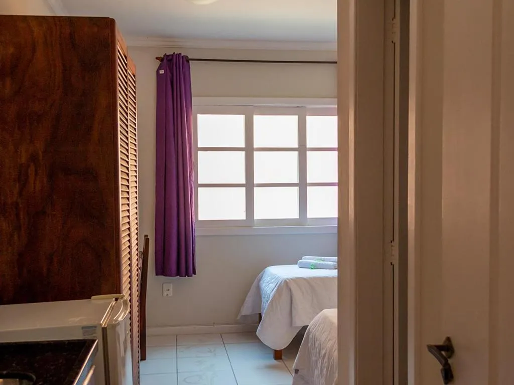 Bed in Pousada Estrada do Ouro