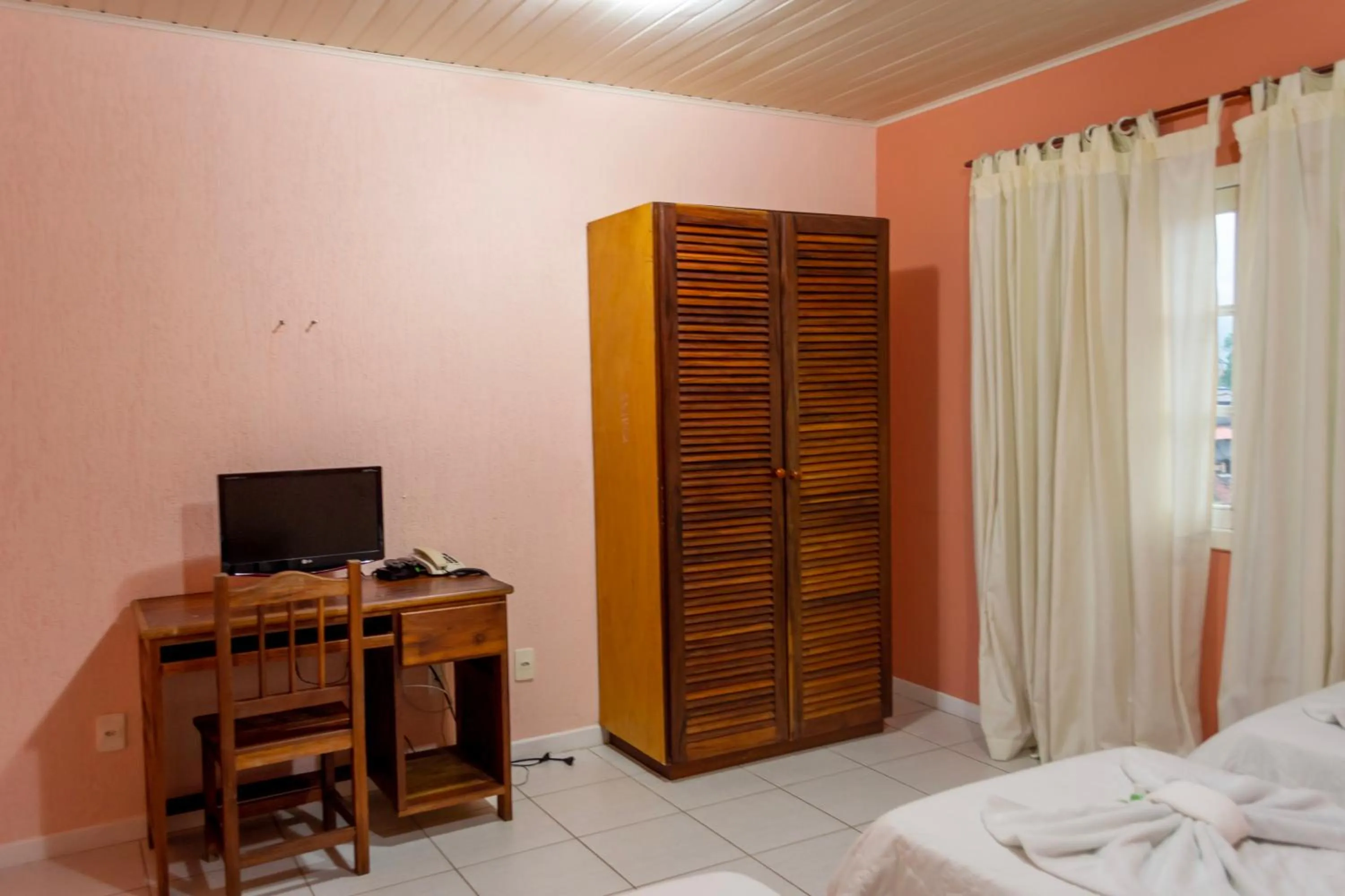 Bed in Pousada Estrada do Ouro