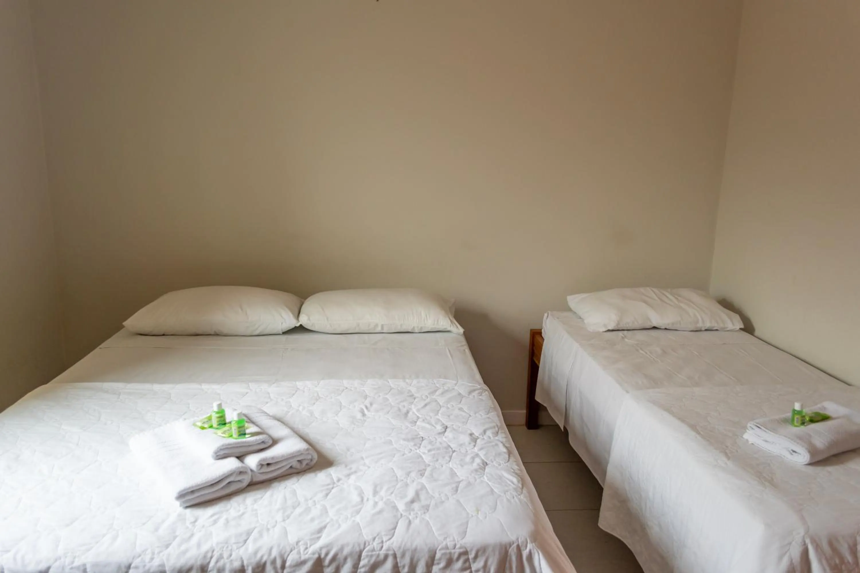 Bed in Pousada Estrada do Ouro