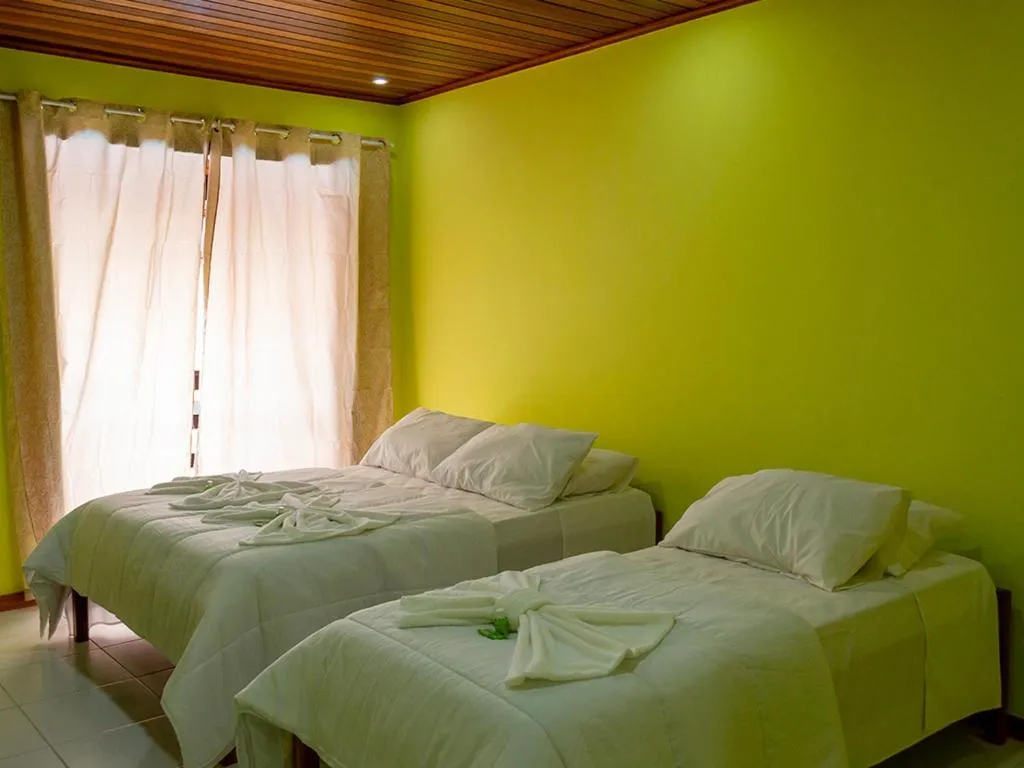 Bed in Pousada Estrada do Ouro