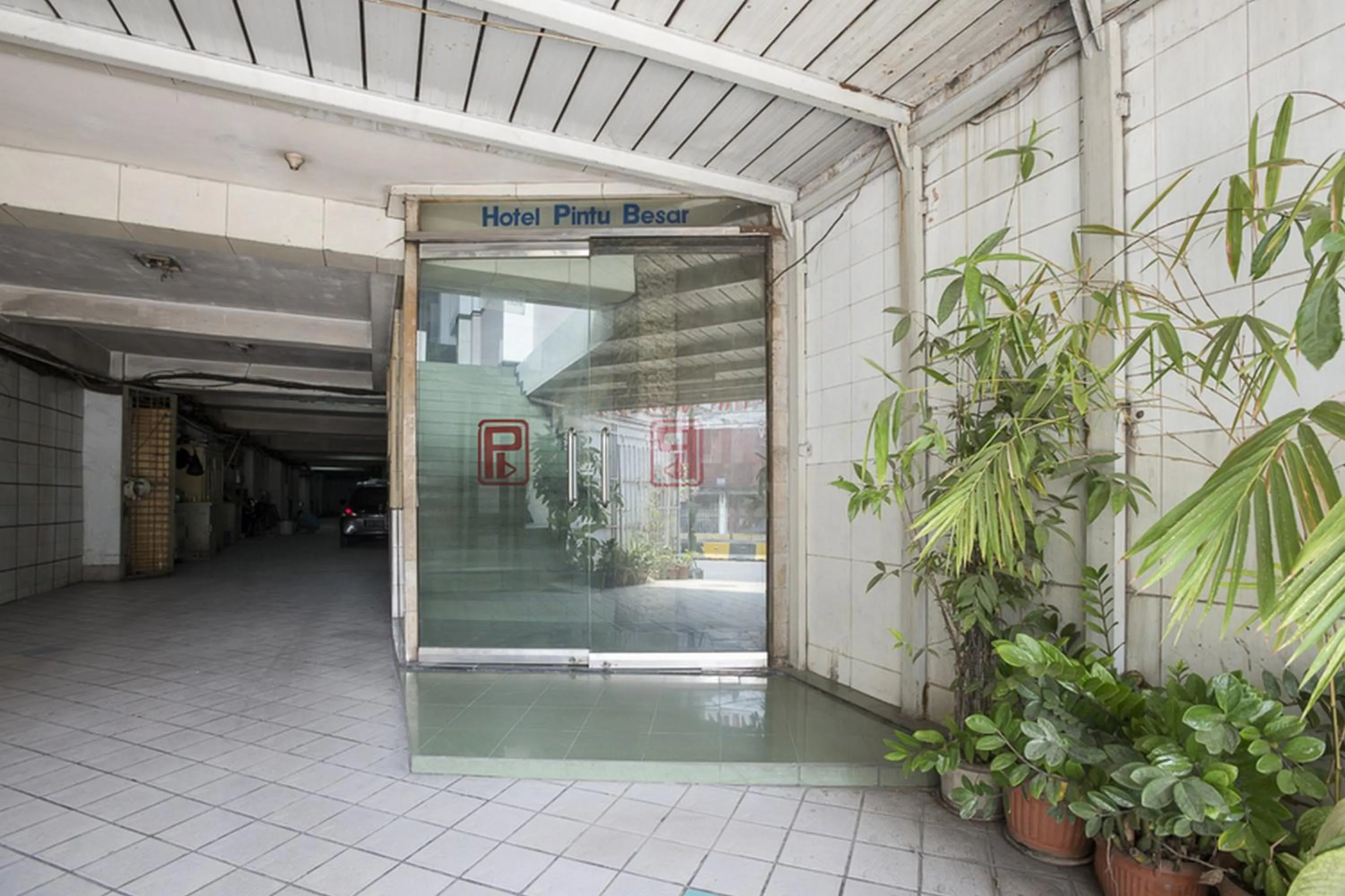 Facade/entrance in RedDoorz Plus near Jakarta Kota Station