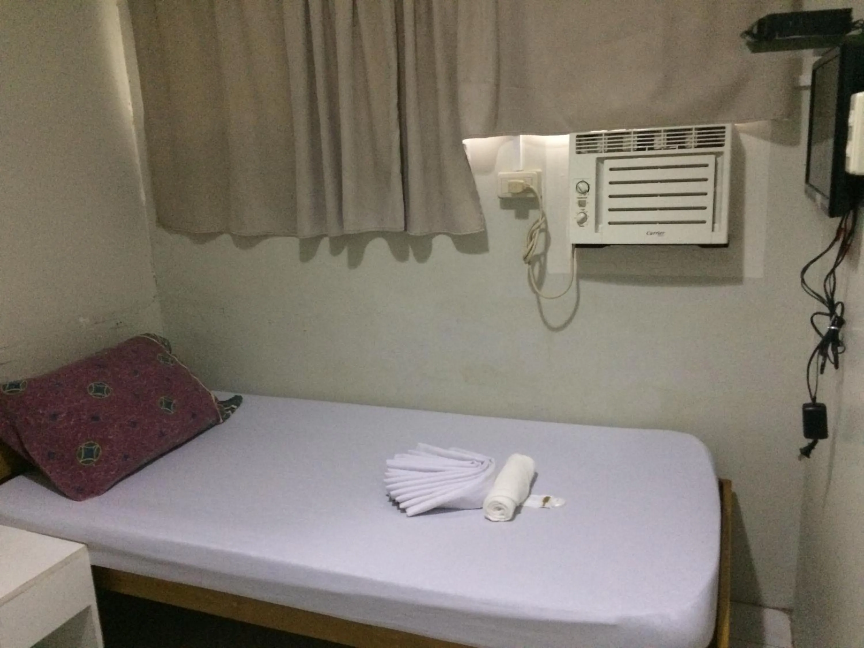 Bed in CrisFil's Lodge Incorporated