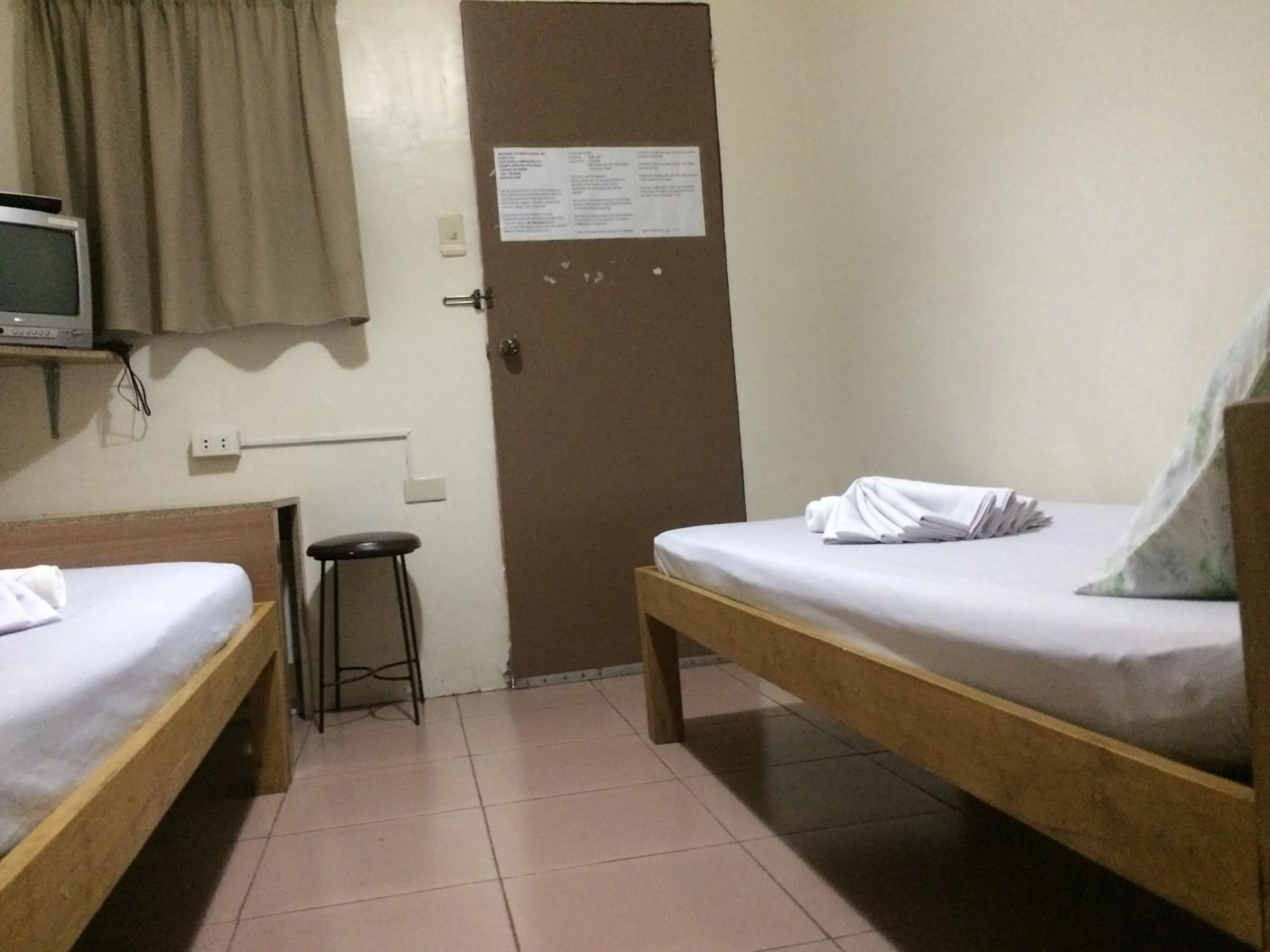 Bed in CrisFil's Lodge Incorporated