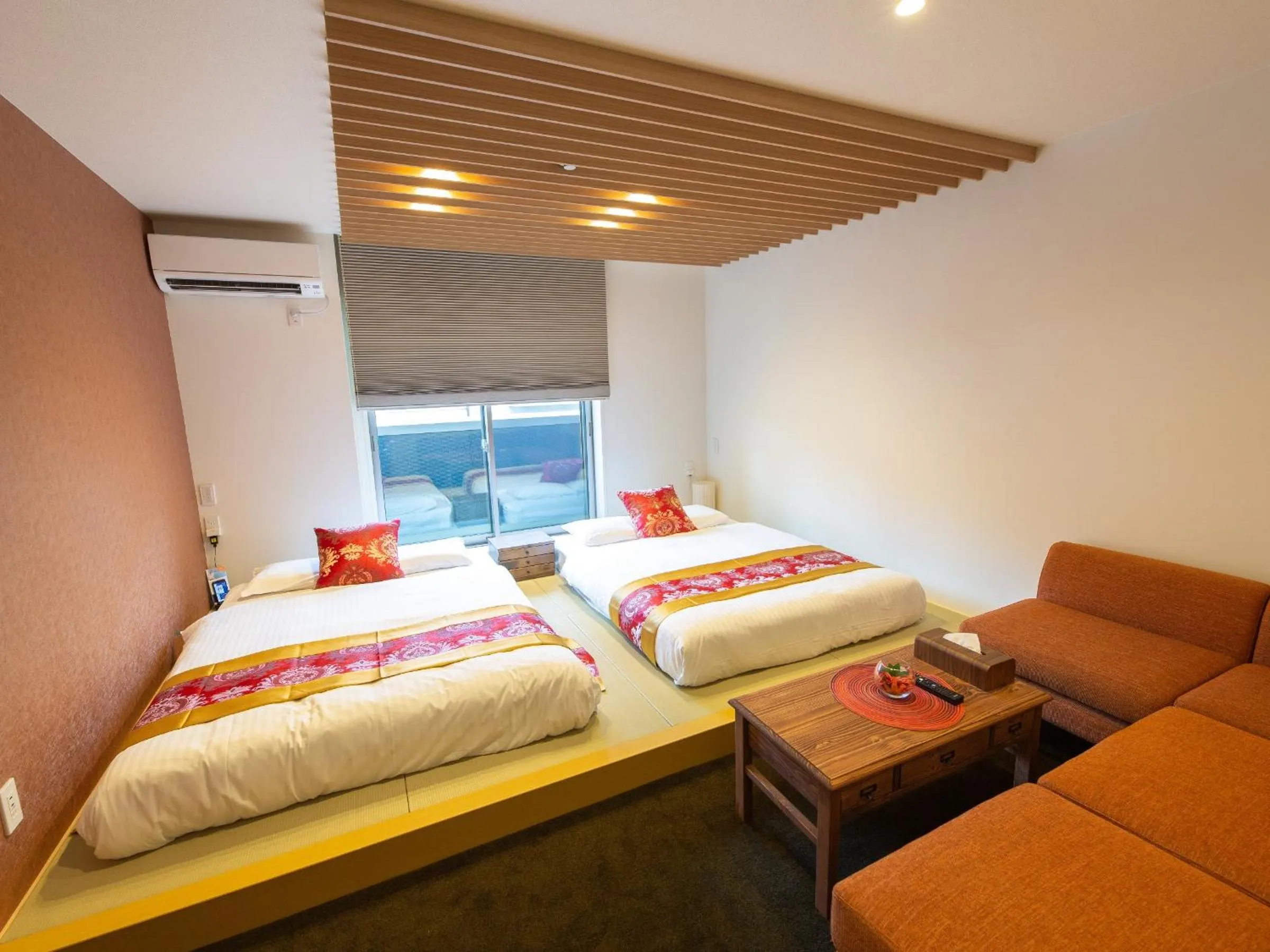 Photo of the whole room, Bed in GRAND BASE Hiroshima Ekimae