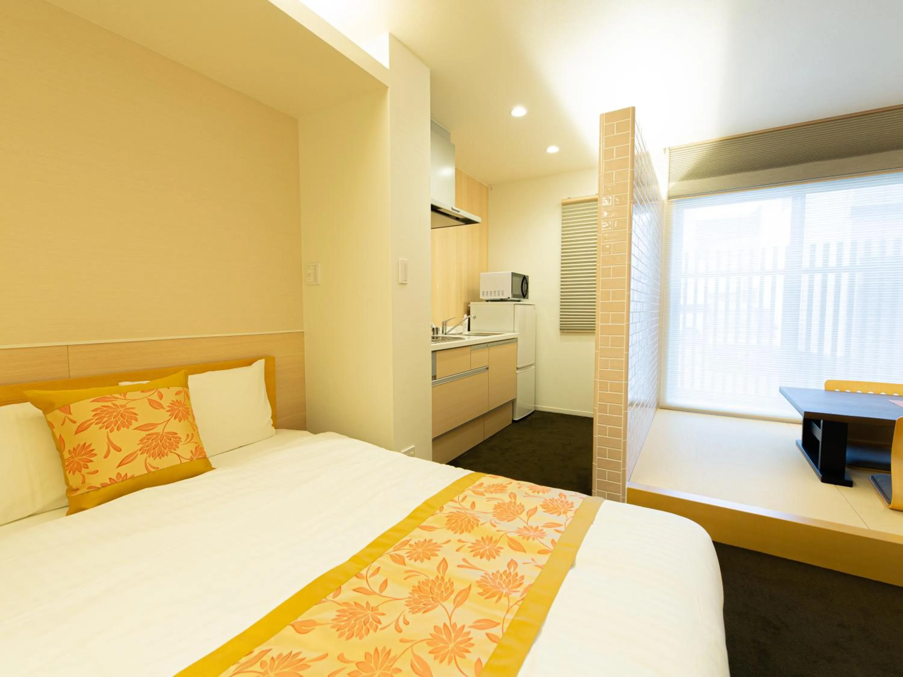 Photo of the whole room, Bed in GRAND BASE Hiroshima Ekimae