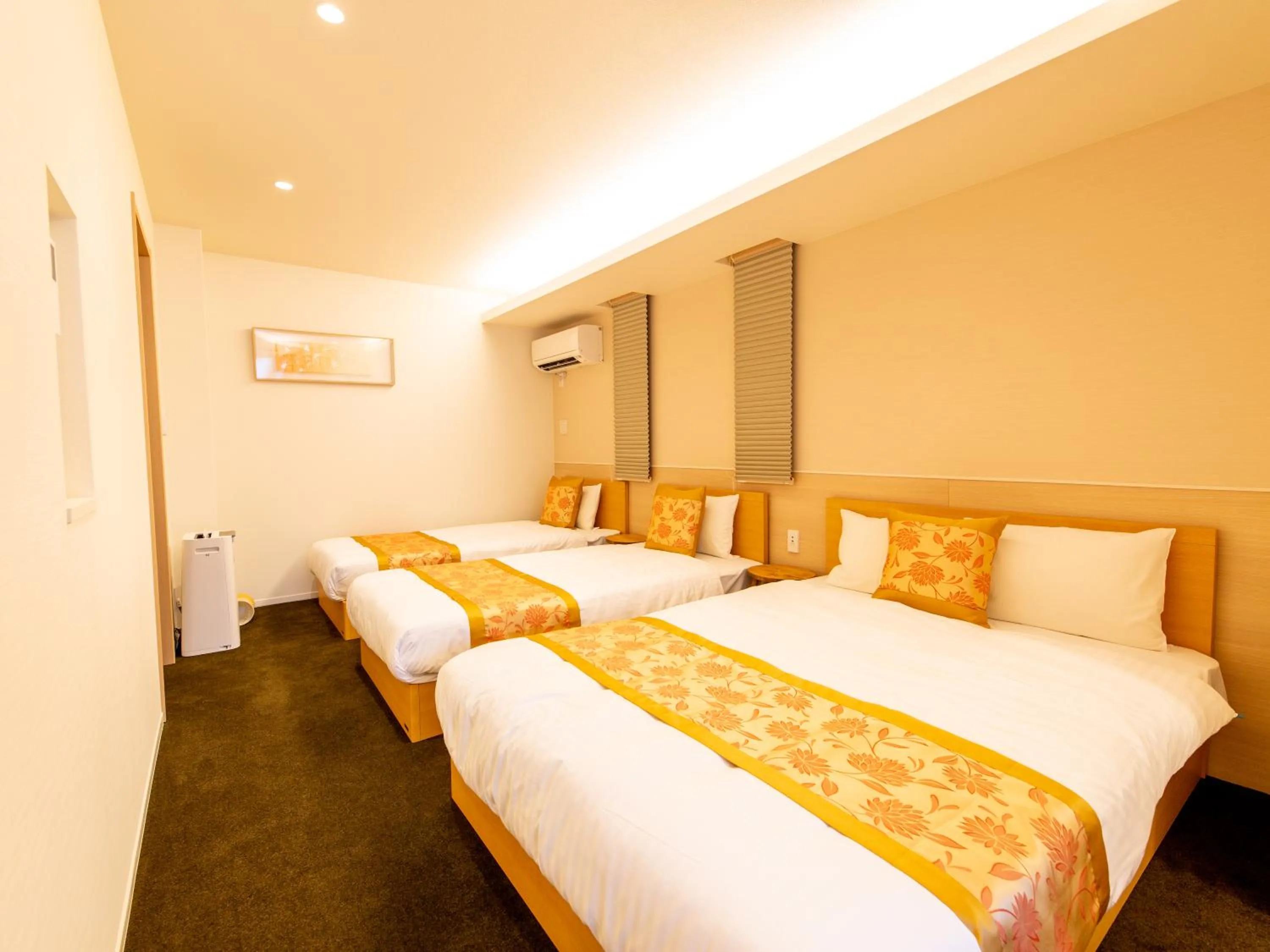 Bed in GRAND BASE Hiroshima Ekimae