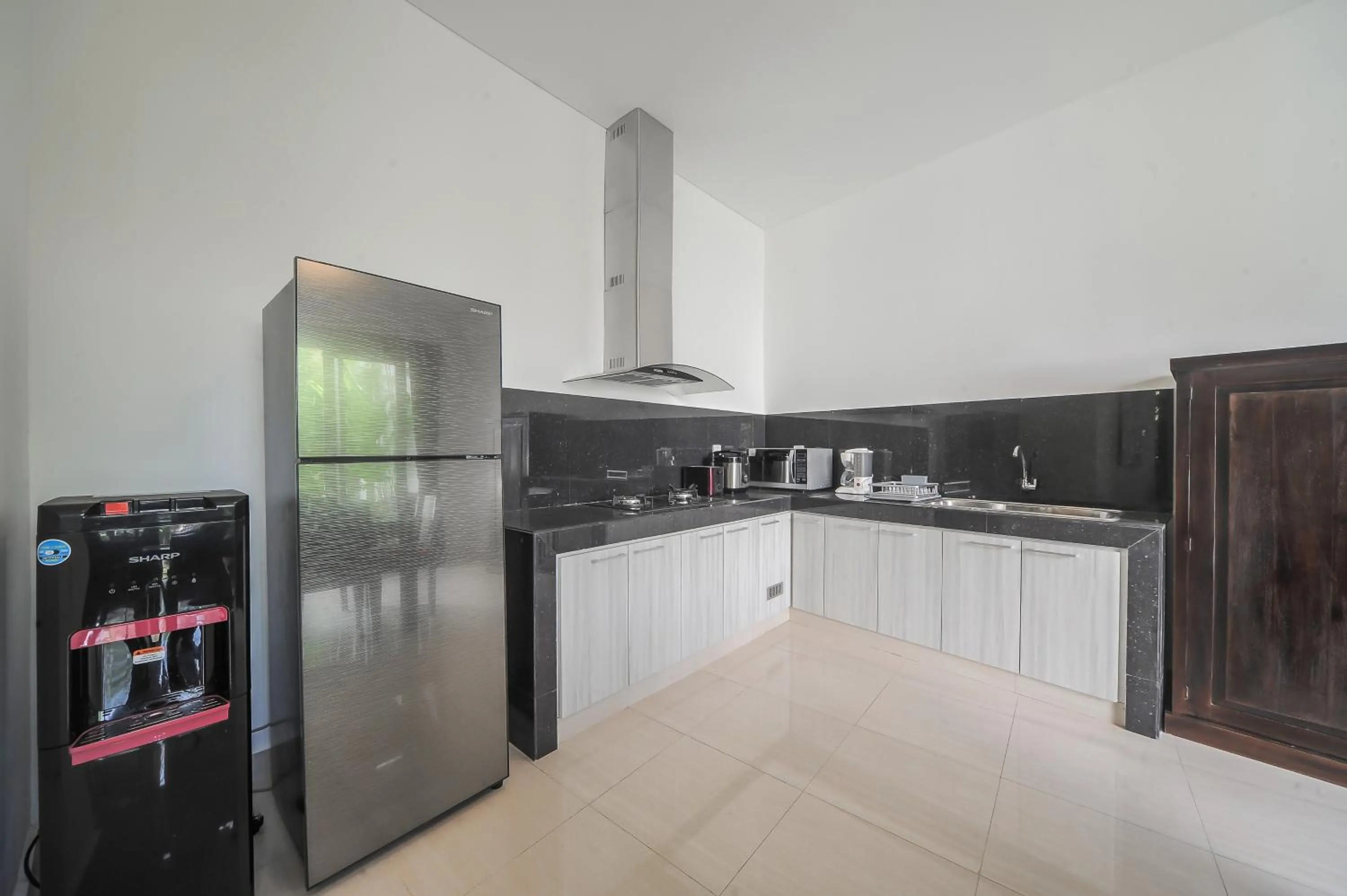 Kitchen or kitchenette in Villa Rindik Sanur