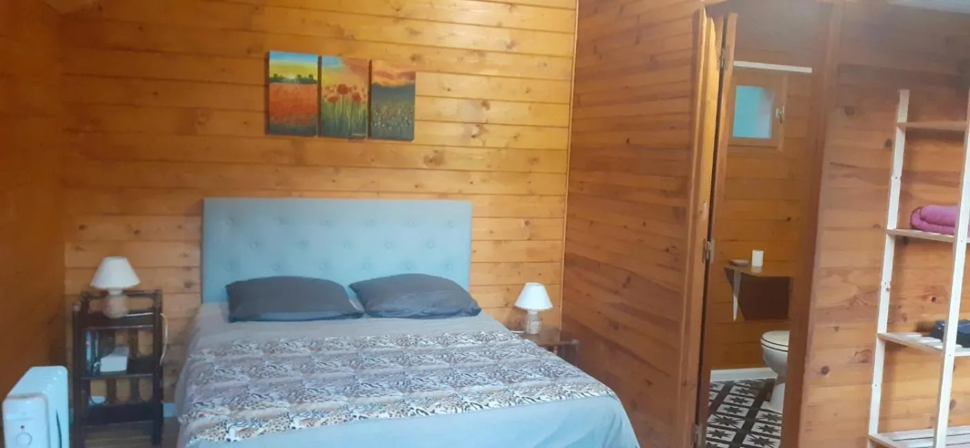 Bed in Chambre La Caunette