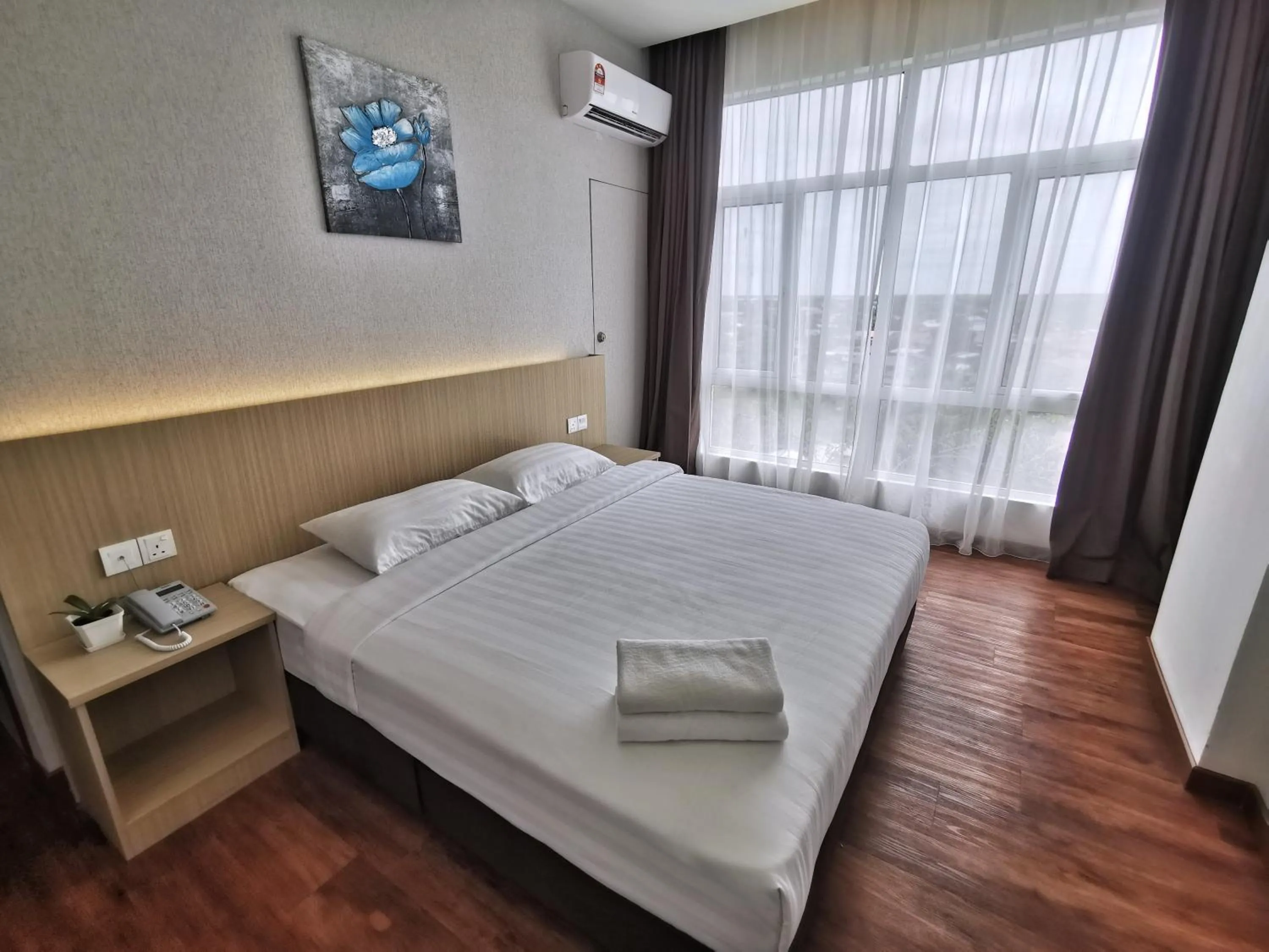 Bed in Green World Hotel